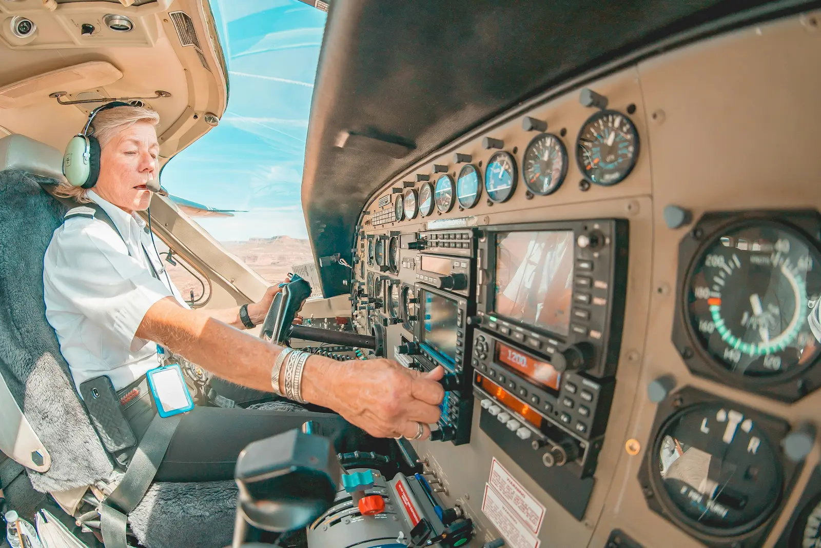 Pilot reviewing logbook before flight