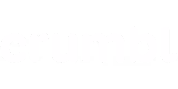 Crumbl brand logo in white lowercase letters on a transparent background.