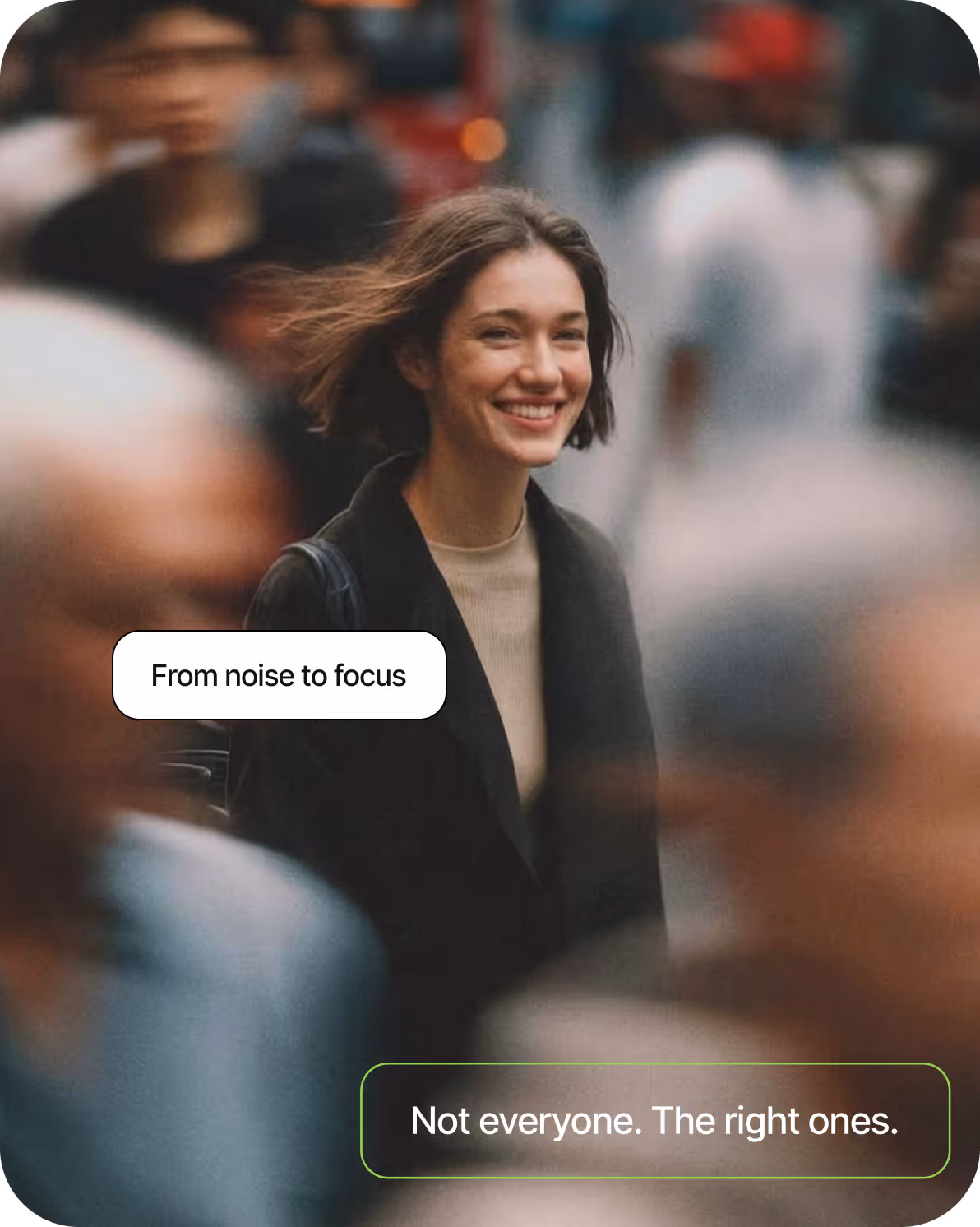 Smiling woman with short hair in focus amid blurred moving crowd on city street.