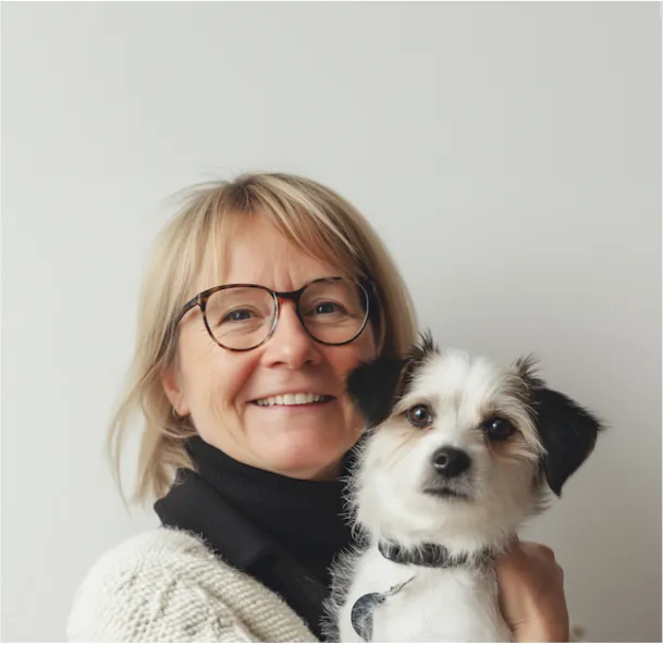 woman hugging dog