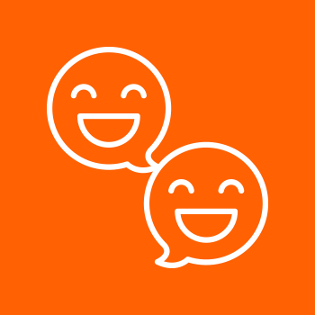 Two white smiling chat bubbles on an orange background representing communication.