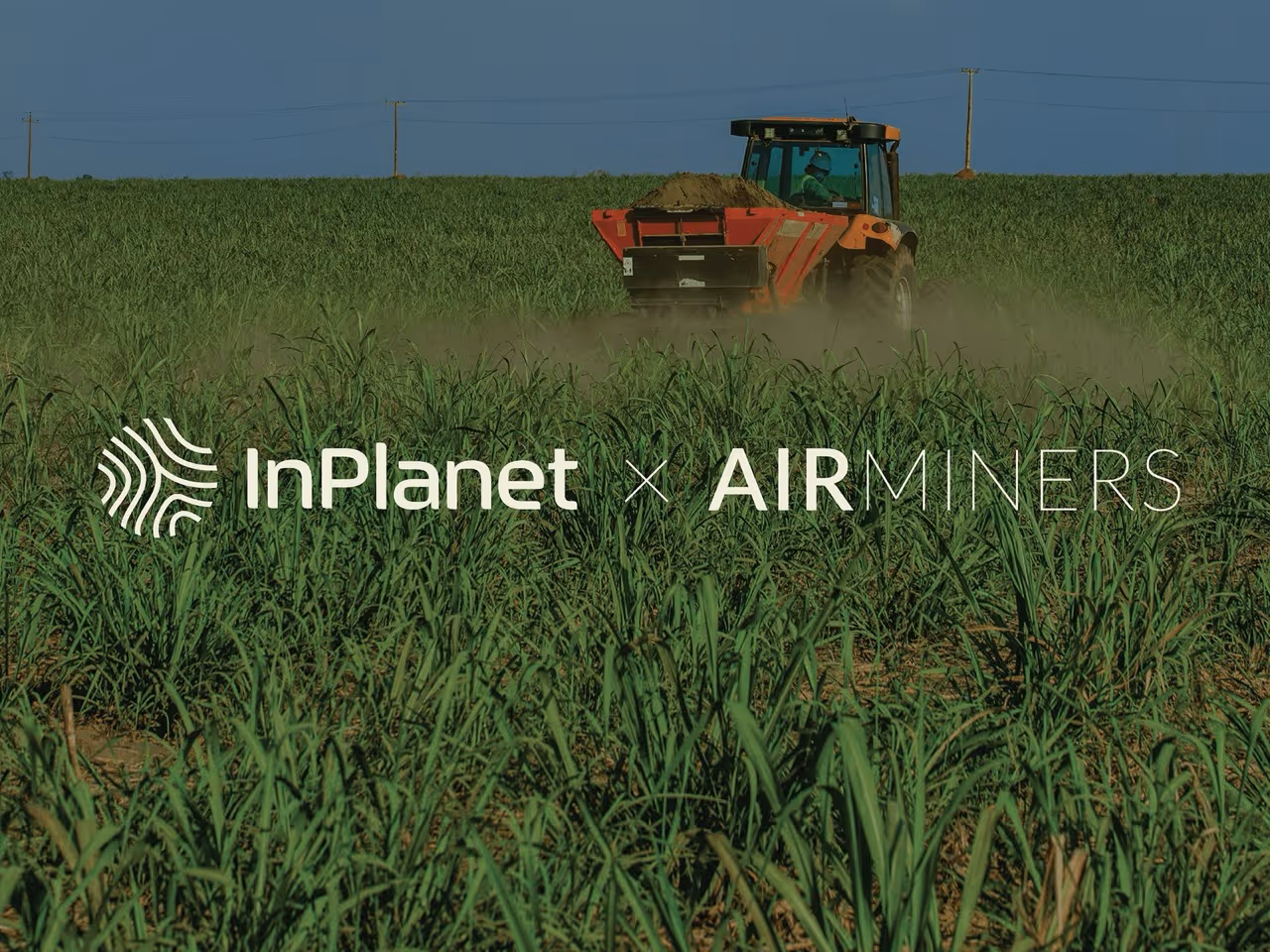 Agricultural machinery spreading crushed rock across cropland as part of an InPlanet and AirMiners carbon removal project.