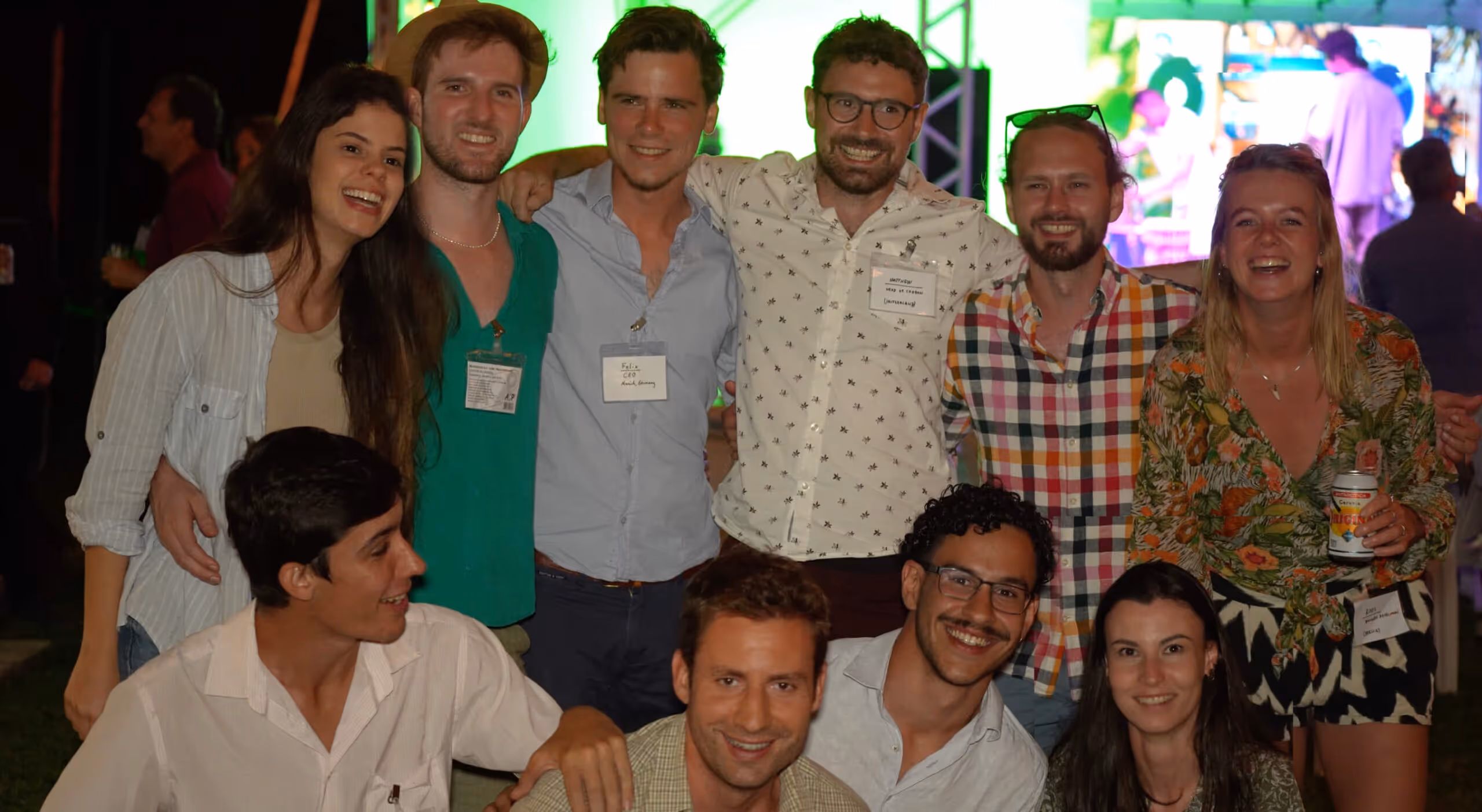 Group photo of InPlanet staff with arms linked