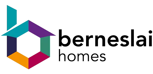 Multicolored geometric shape forming a stylized letter B on black background.