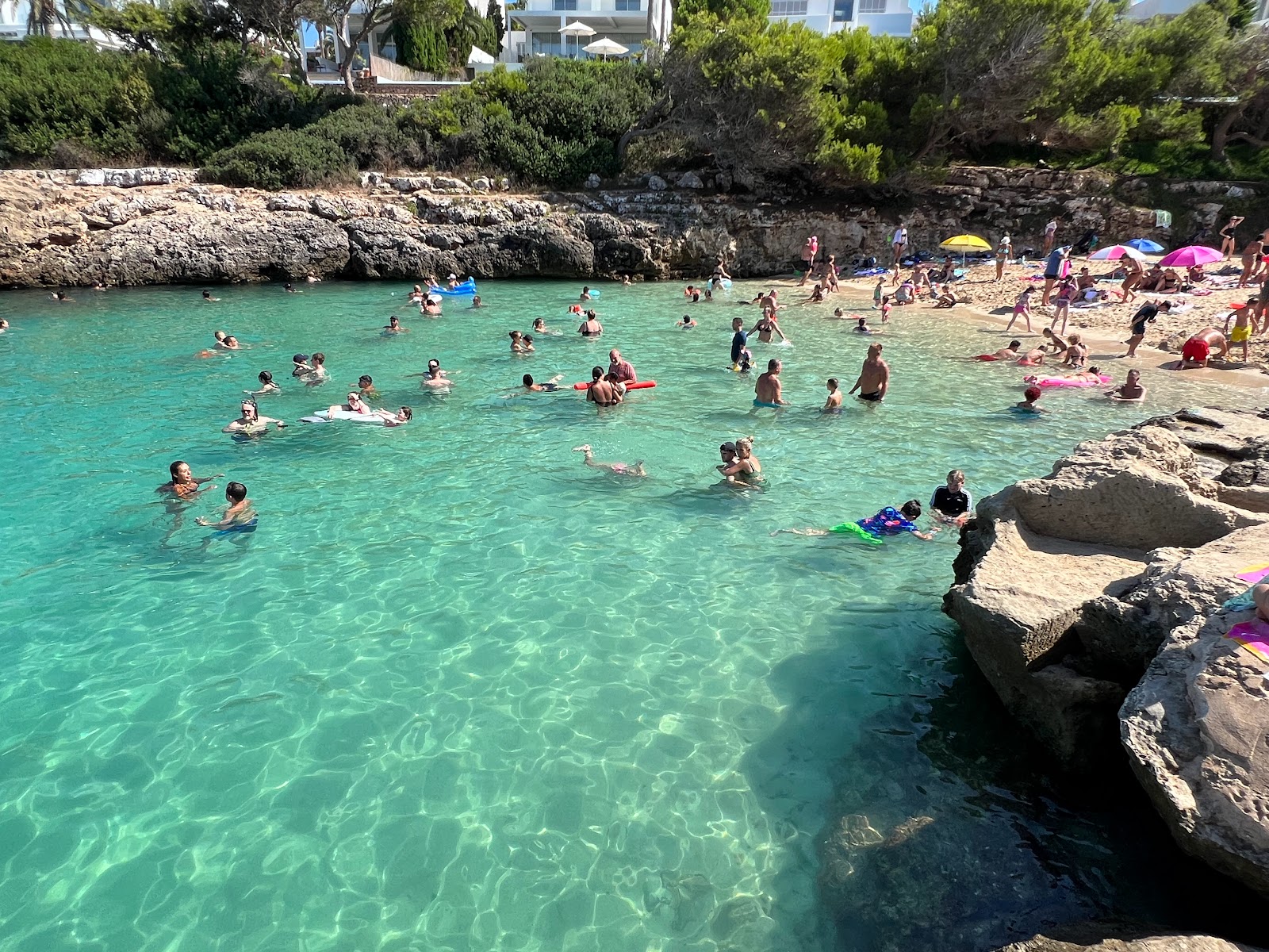 Caló des Pou beach near Cala Egos in Cala d’Or with clear water and white sand
