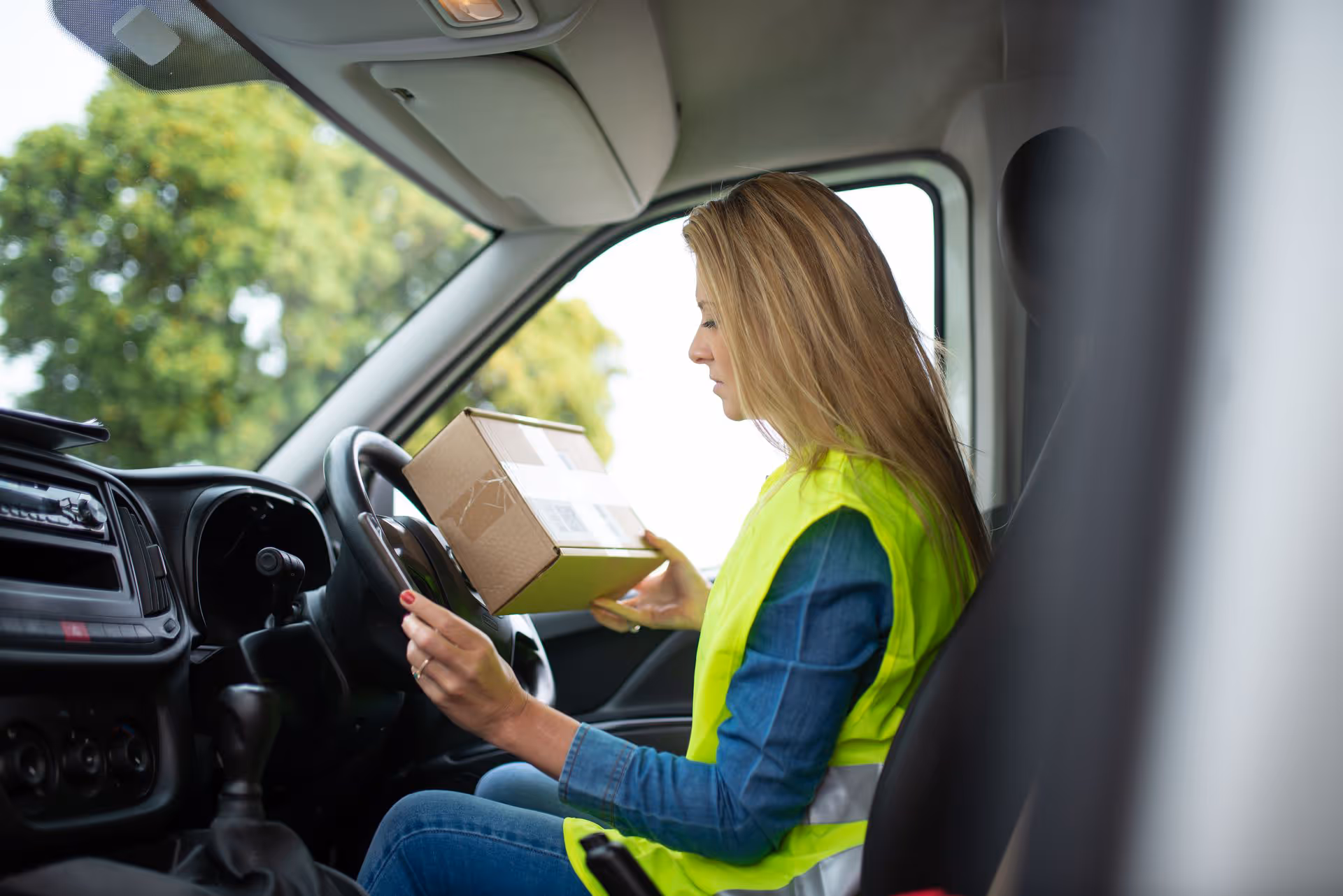 Delivery courier holding parcel