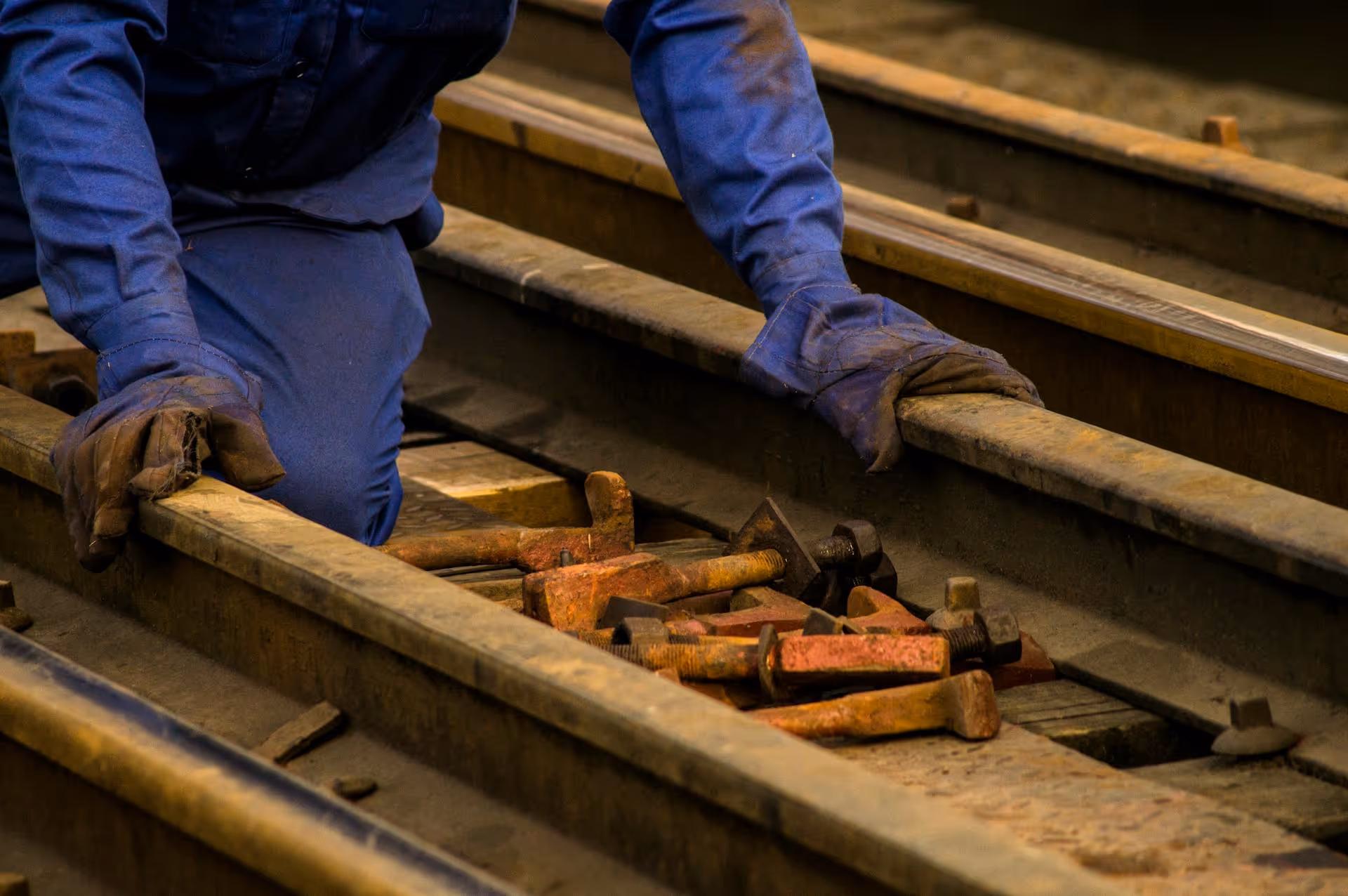 Worker on train track
