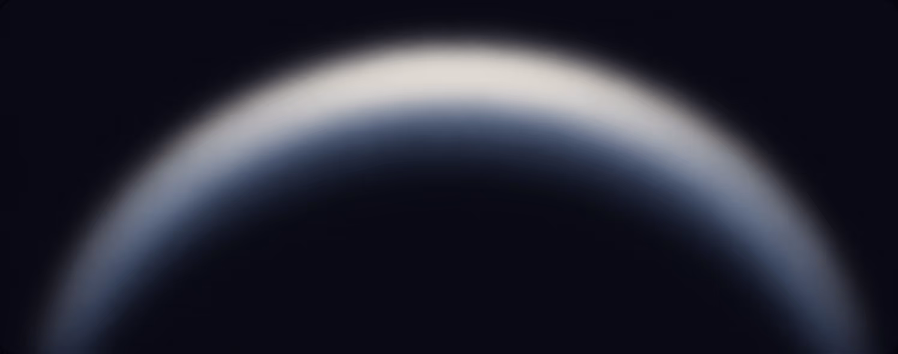 Blurred crescent shape of a planet or moon against dark space background.