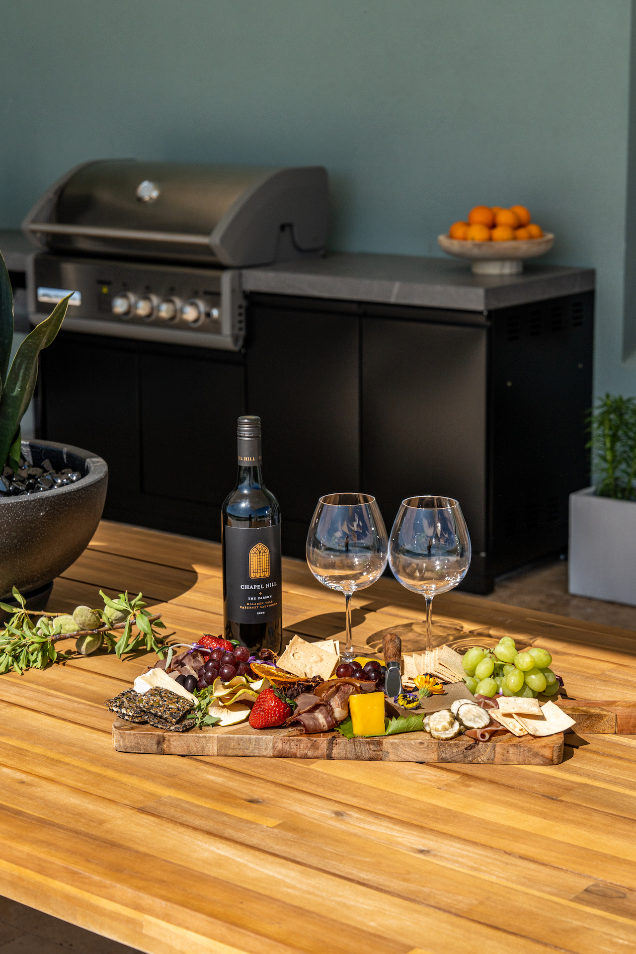 Outdoor entertaining area with charcuterie board