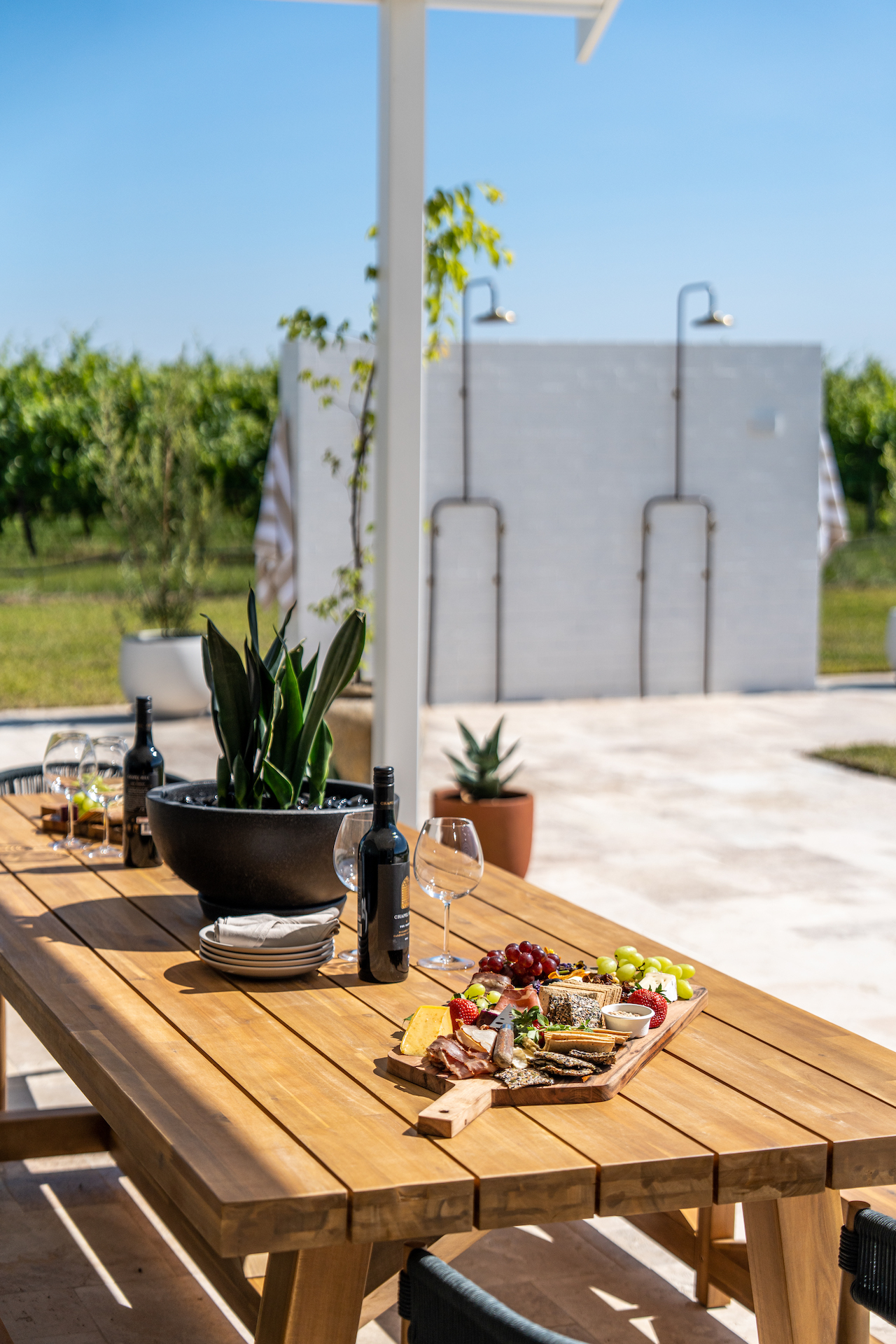 Outdoor entertaining area with charcuterie board