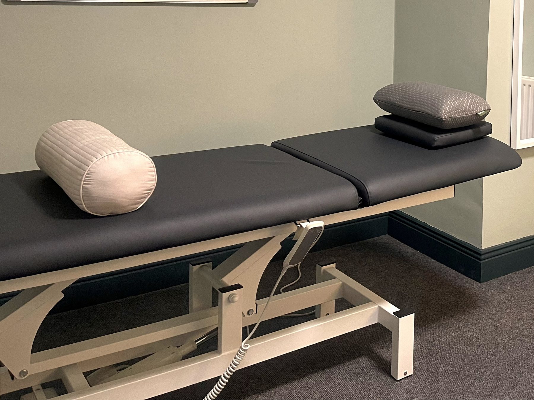 Adjustable treatment plinth in the TandemBalance clinic room, Cork