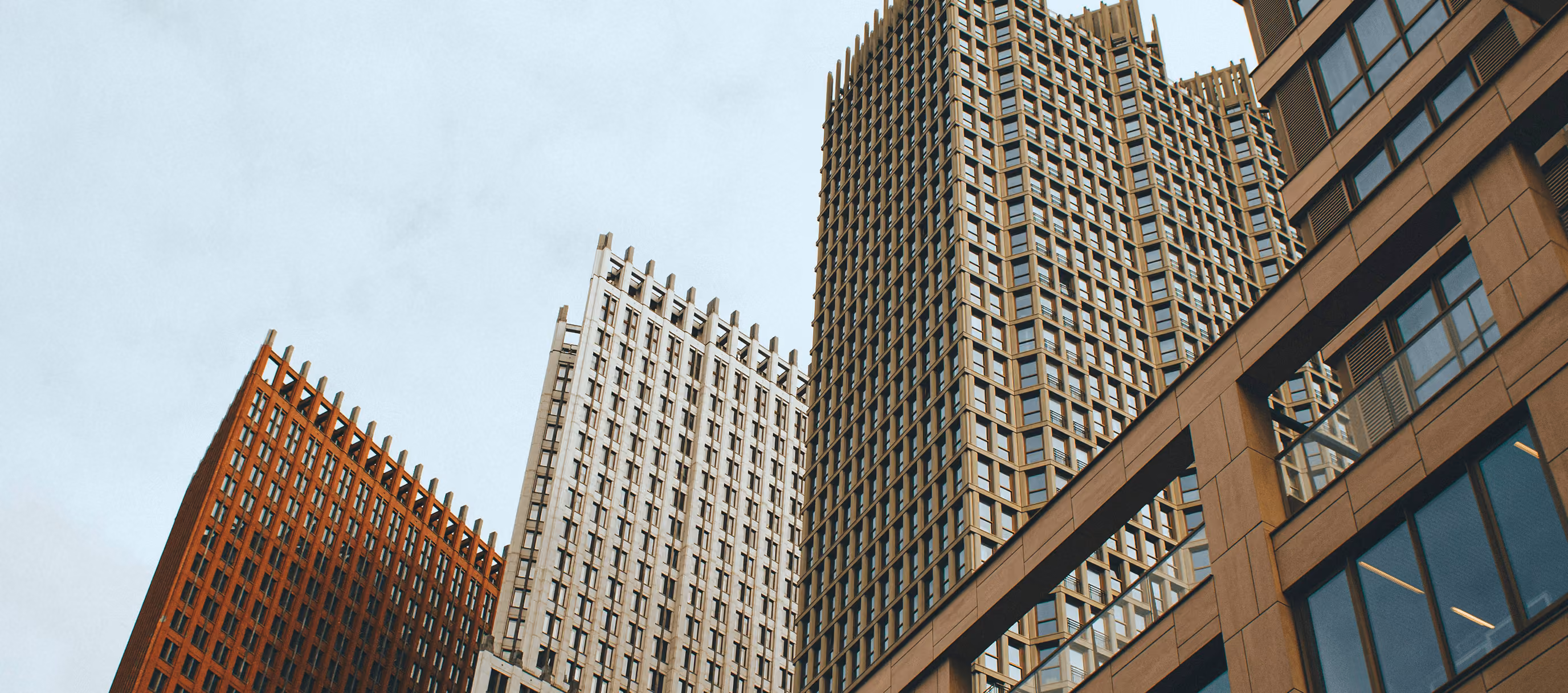 Close up shot of office buildings against the sky