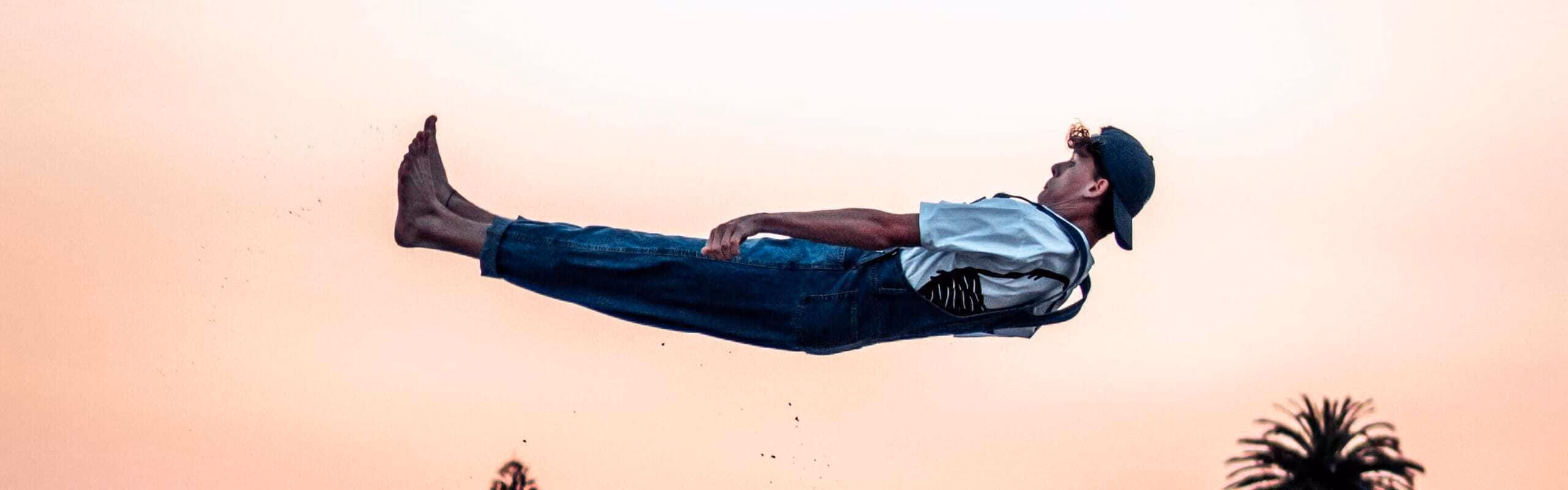 A man jumping horizontally