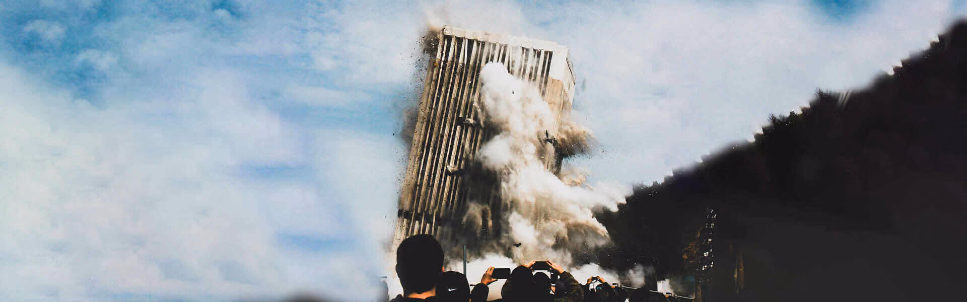 A building falling halfway through demolition