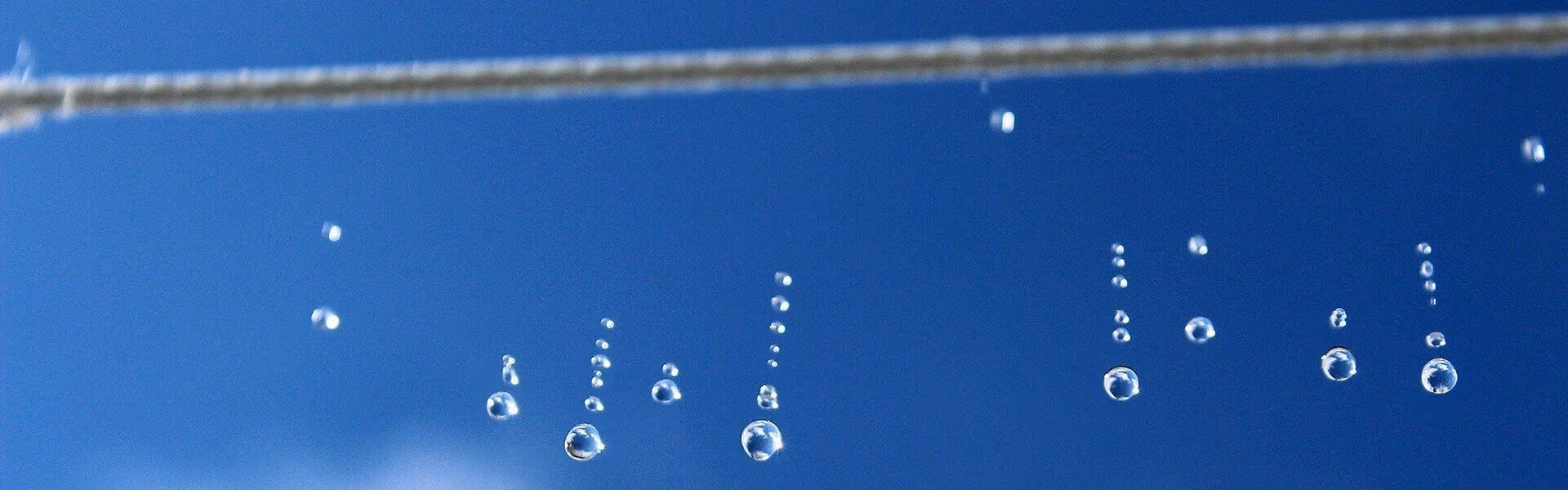 Close up of water droplets falling