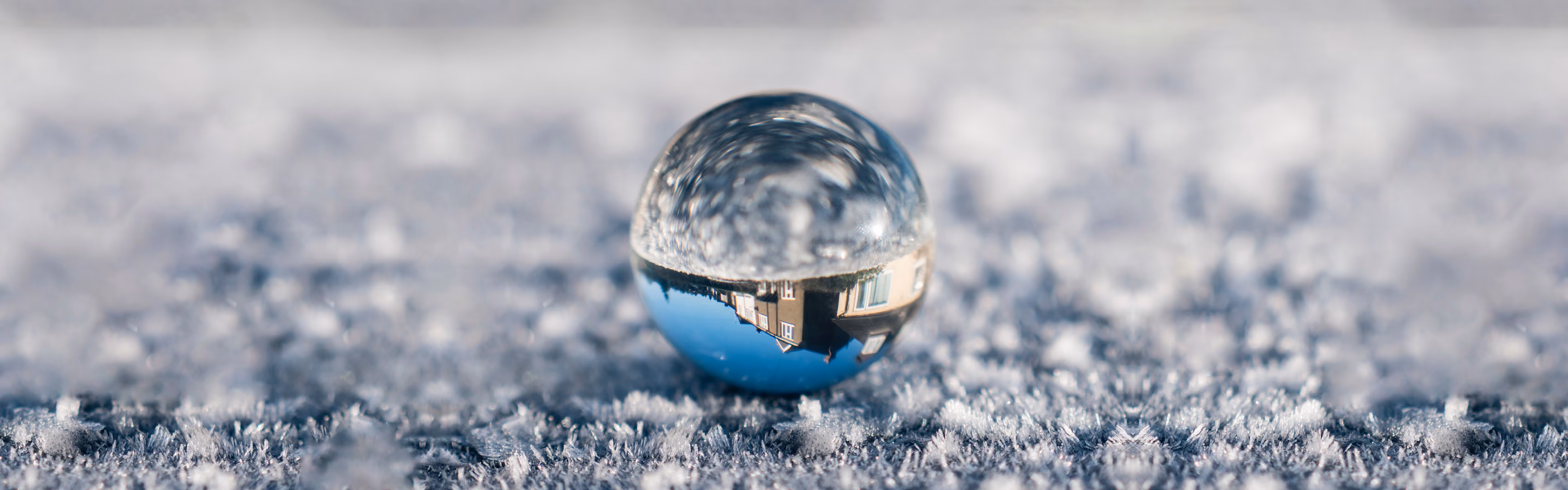Close up shot of a glass marble on the floor