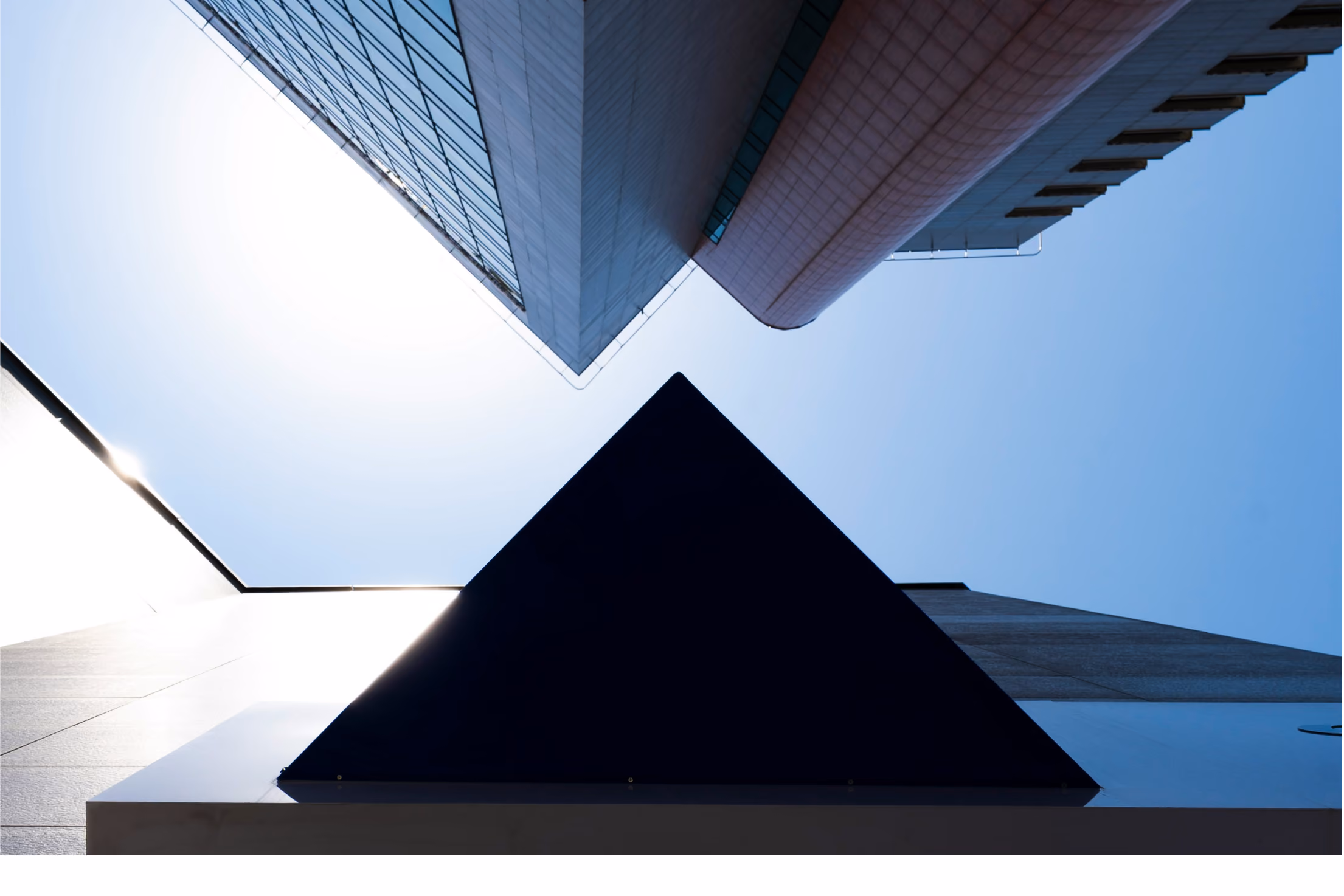 Top of a building reflecting from its windows