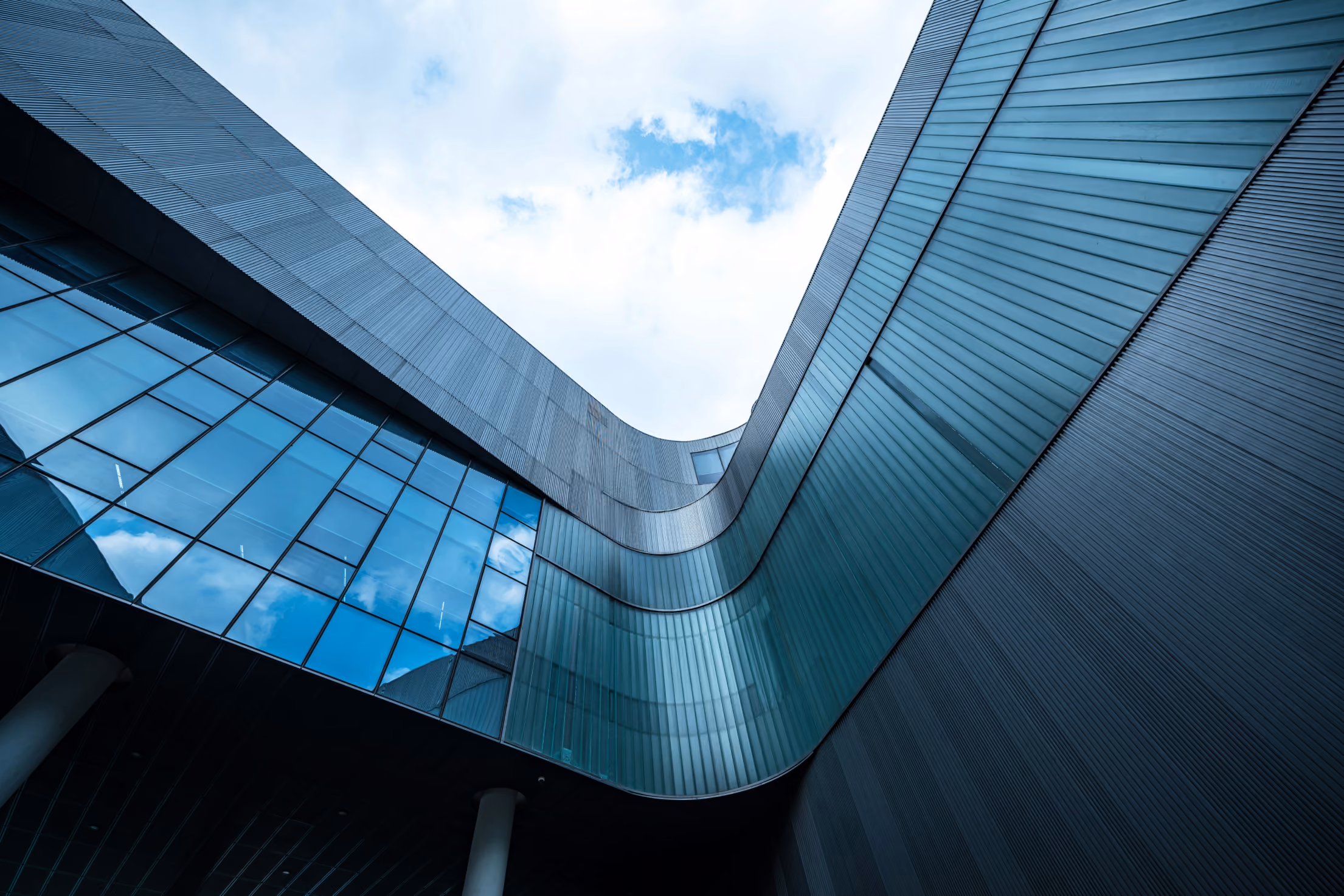Close up shot at the base of a tall building looking up