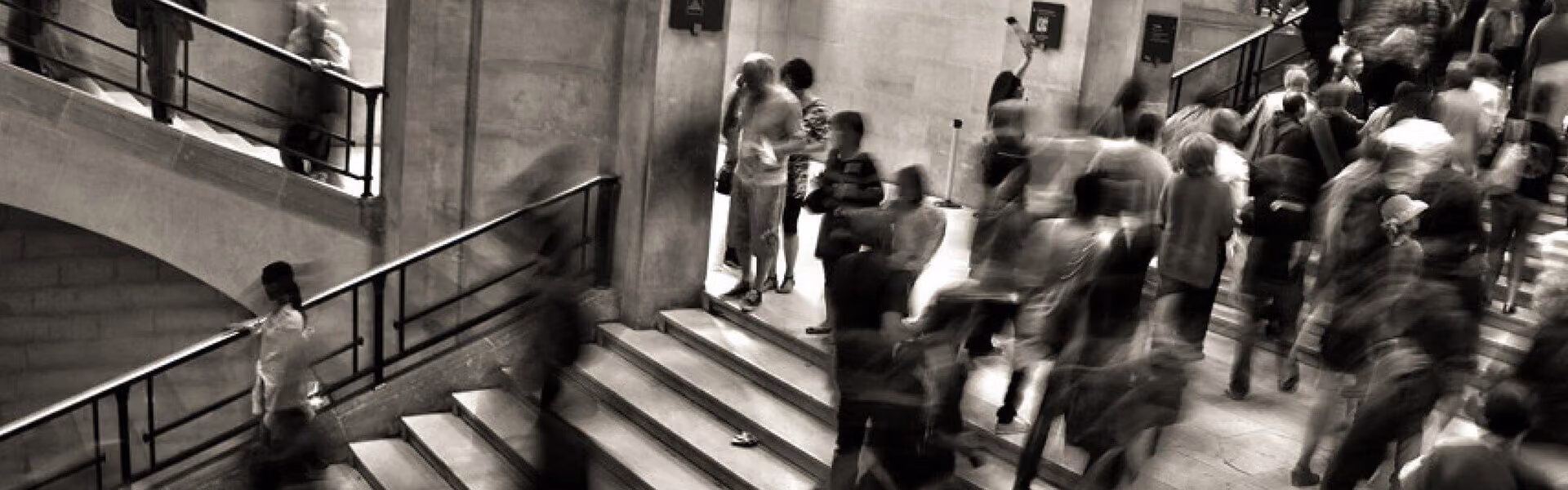 Image of busy people going up and down stairs