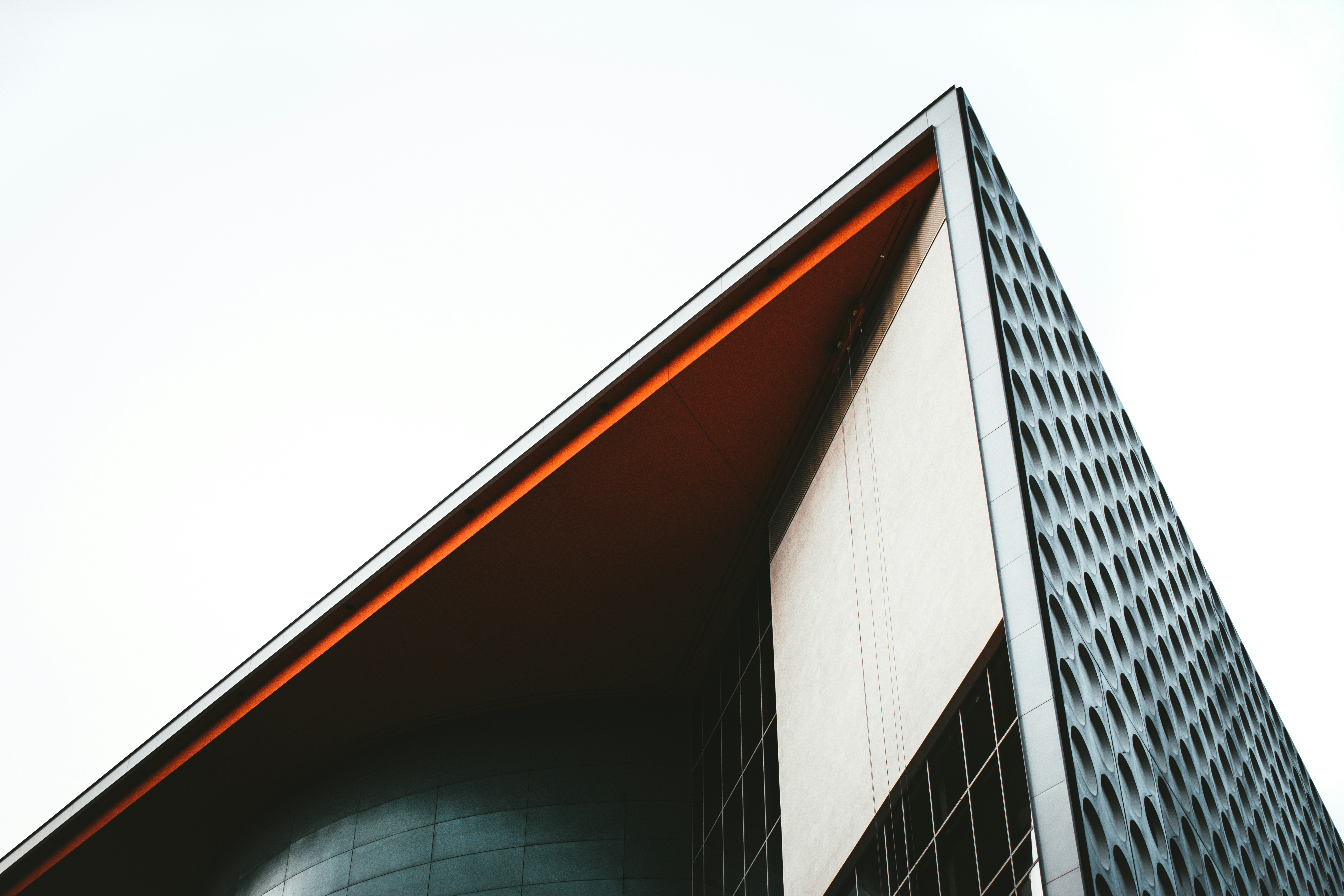 Close up shot of the top of a corporate building