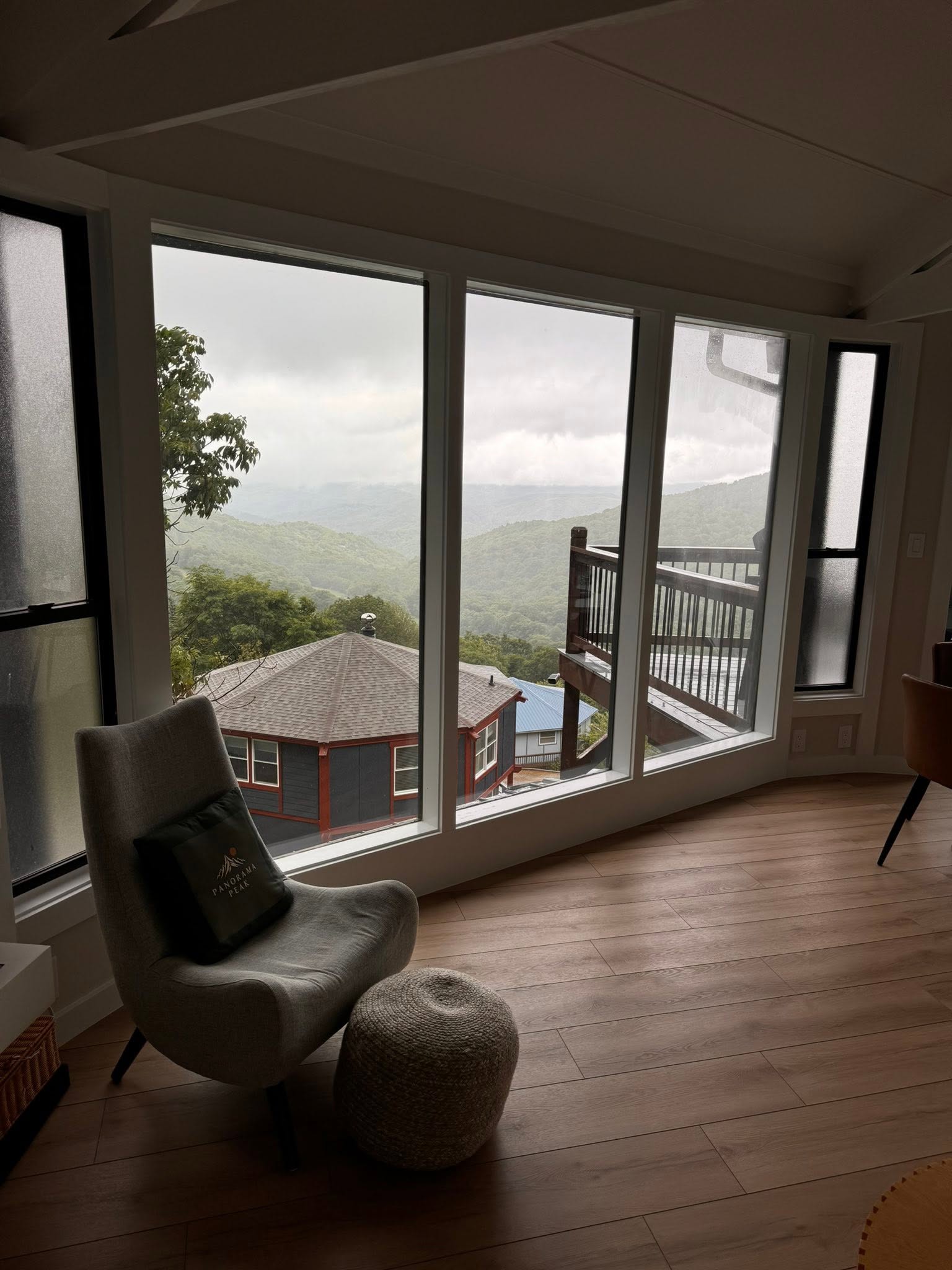 Cozy window nook with floor-to-ceiling High Country mountain views in a vacation rental