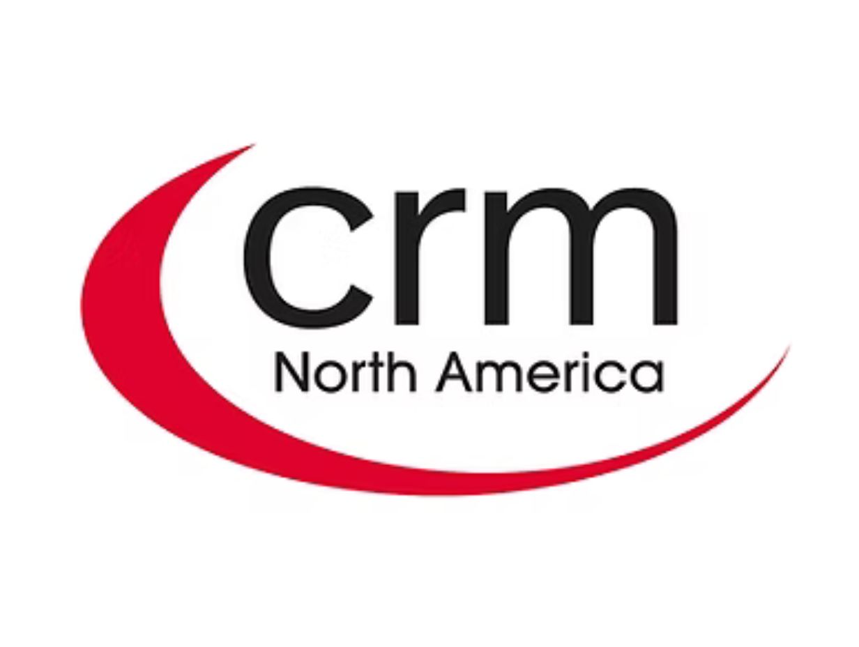 CRM North America logo with black text and a red swoosh on a white background.