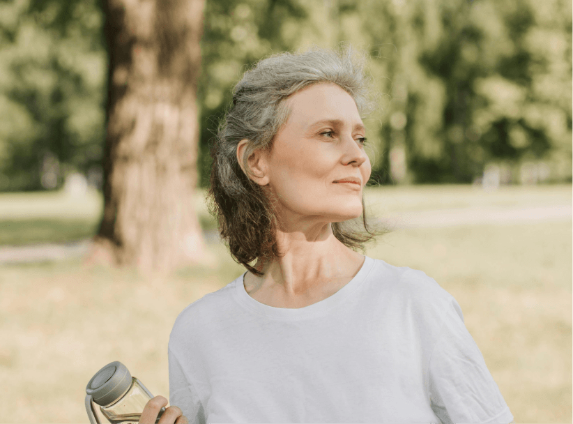 Woman smiling outdoors
