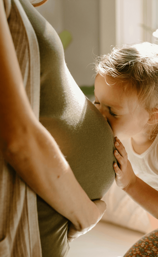 Parent and child standing together