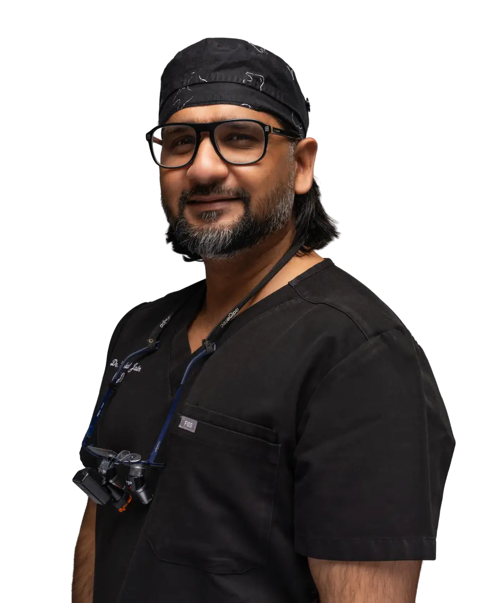 Dr. Vishal Jain, dentist, professional headshot. La Perle Dental Center in Edmonton, AB TST 3T9