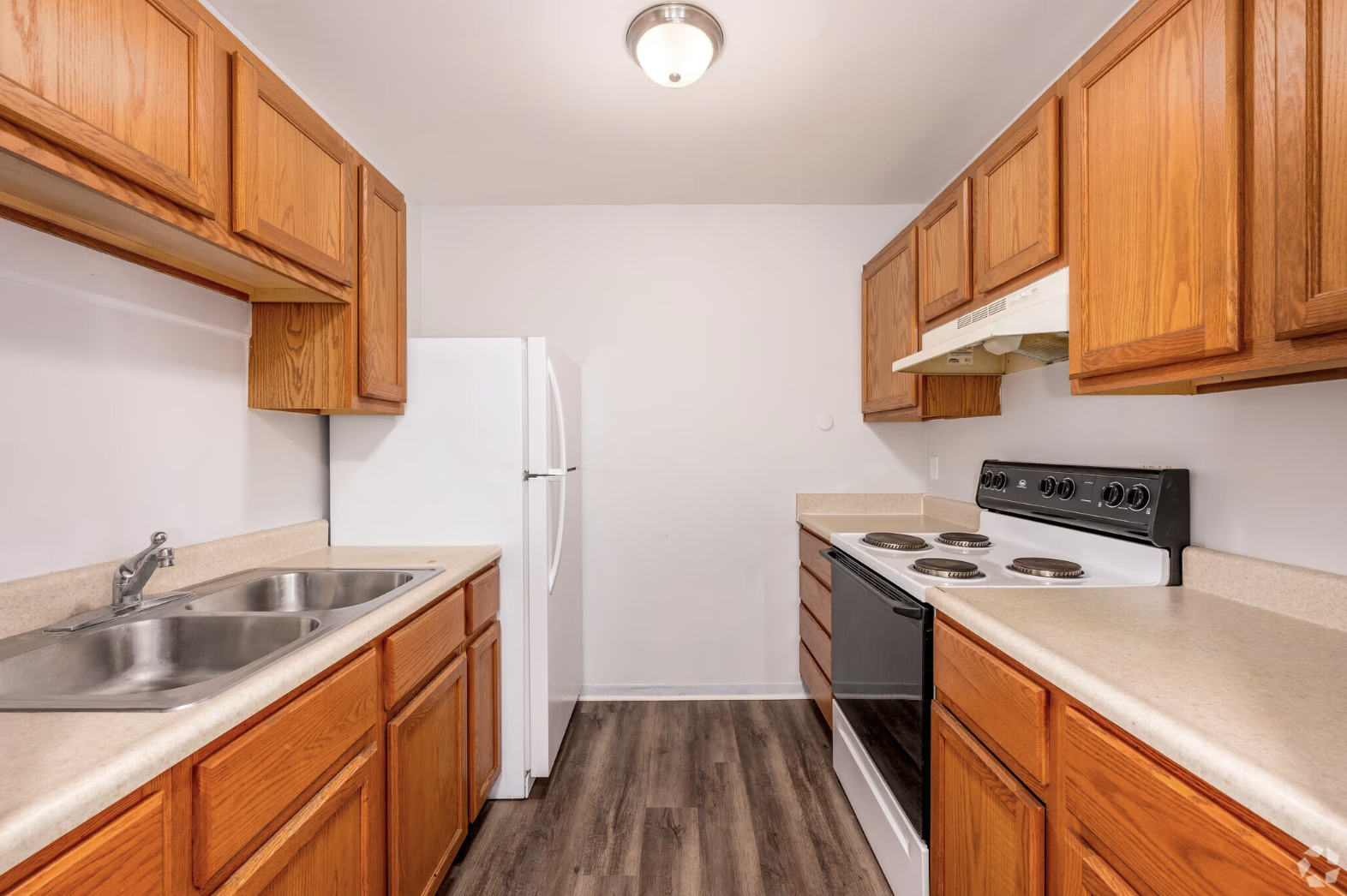 Kitchen with brown cabinets