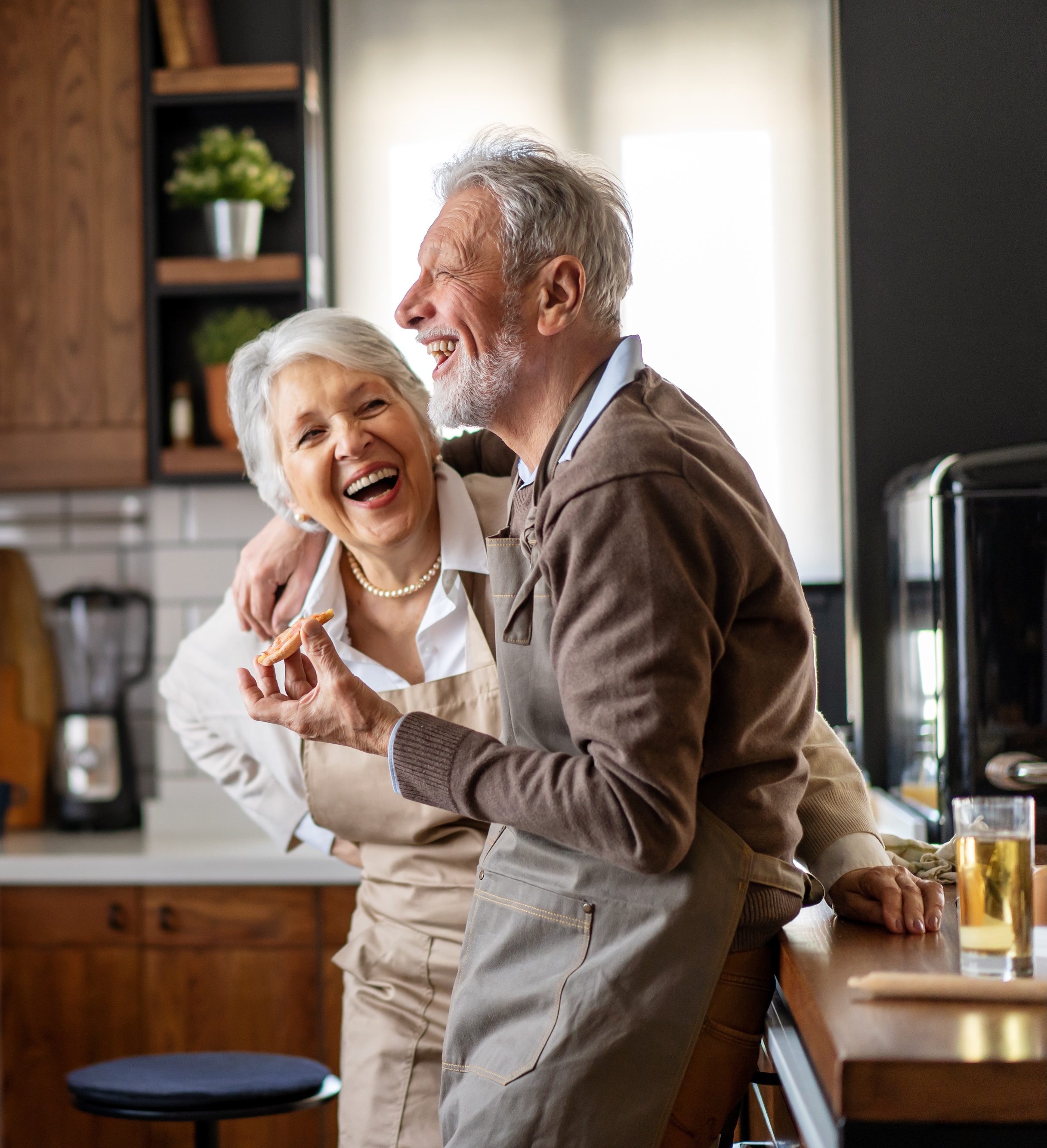 Senior couple in kitchen stock image