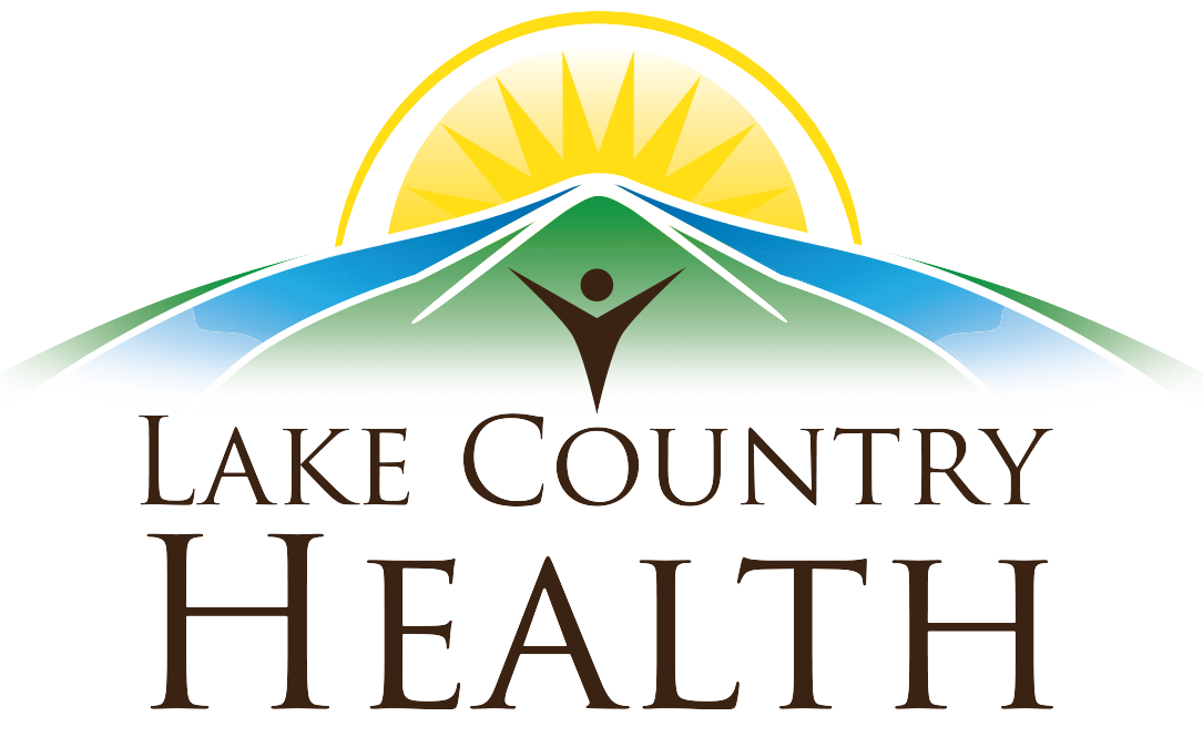 Lake Country Health Logo. Sun shining over 2 streams of water, a green field and the words Lake Country Health spelled out