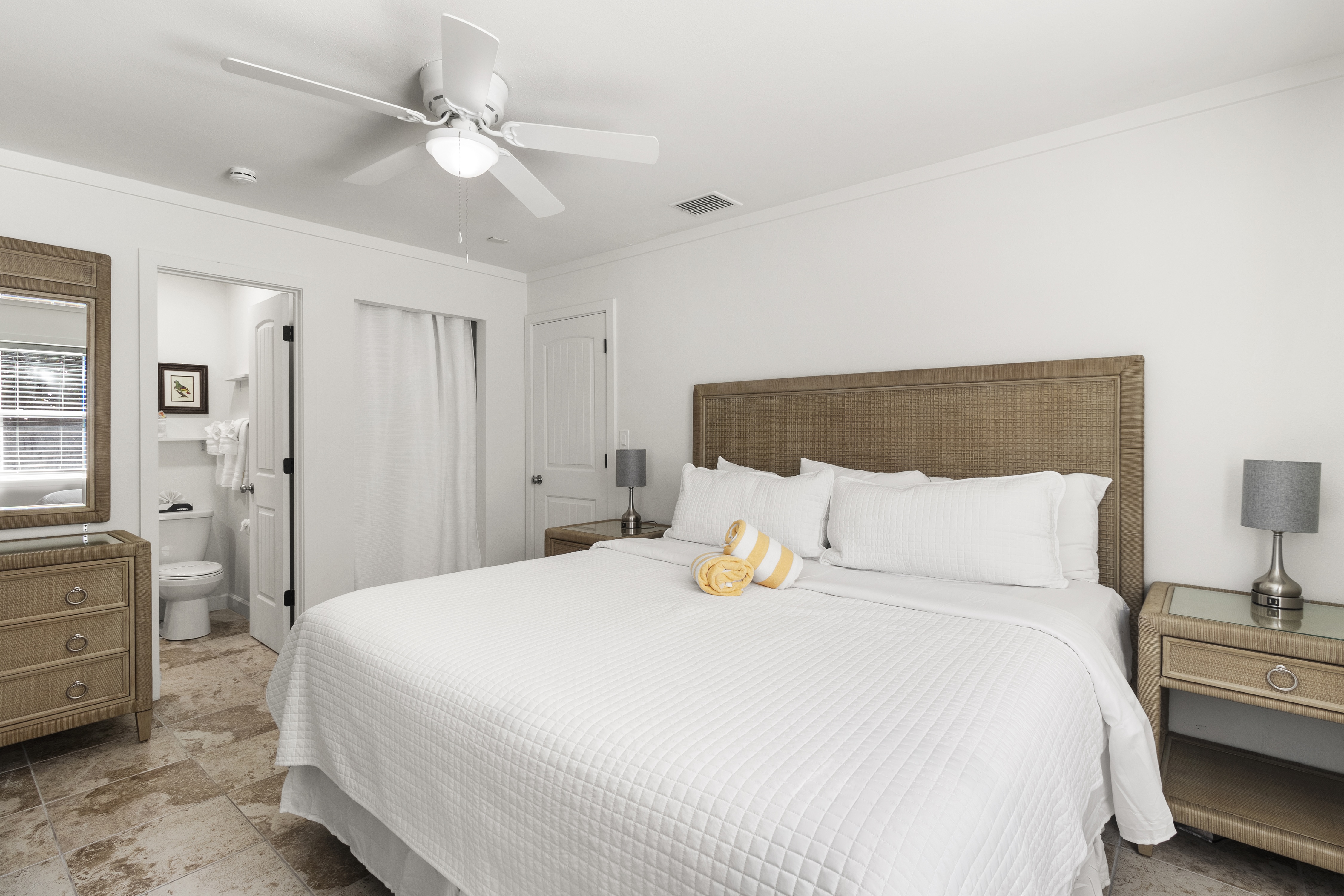 Private porch and heated pool grounds at The Wicker Inn, Longboat Key