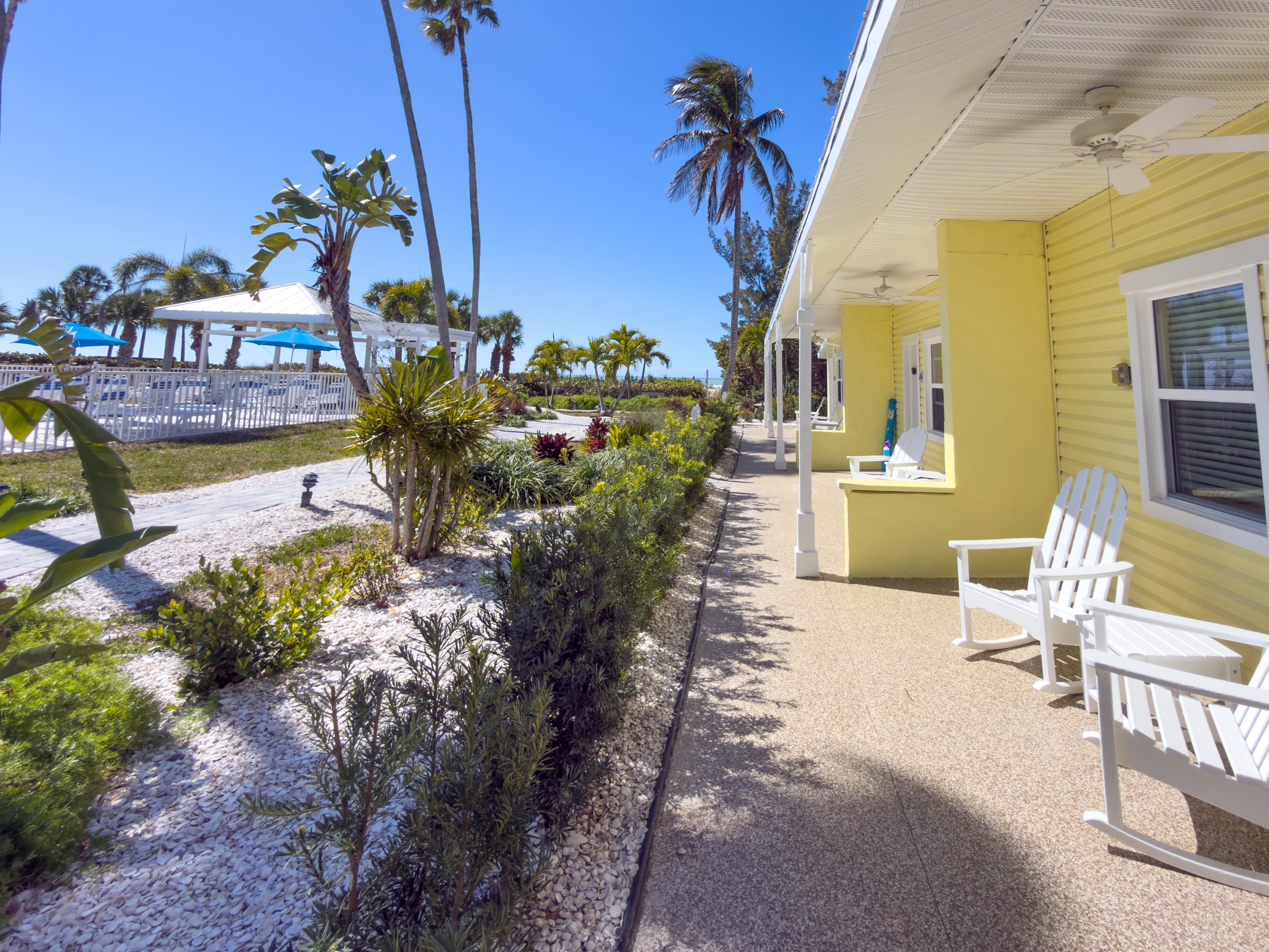 Suite living area with full kitchen at The Wicker Inn, Longboat Key