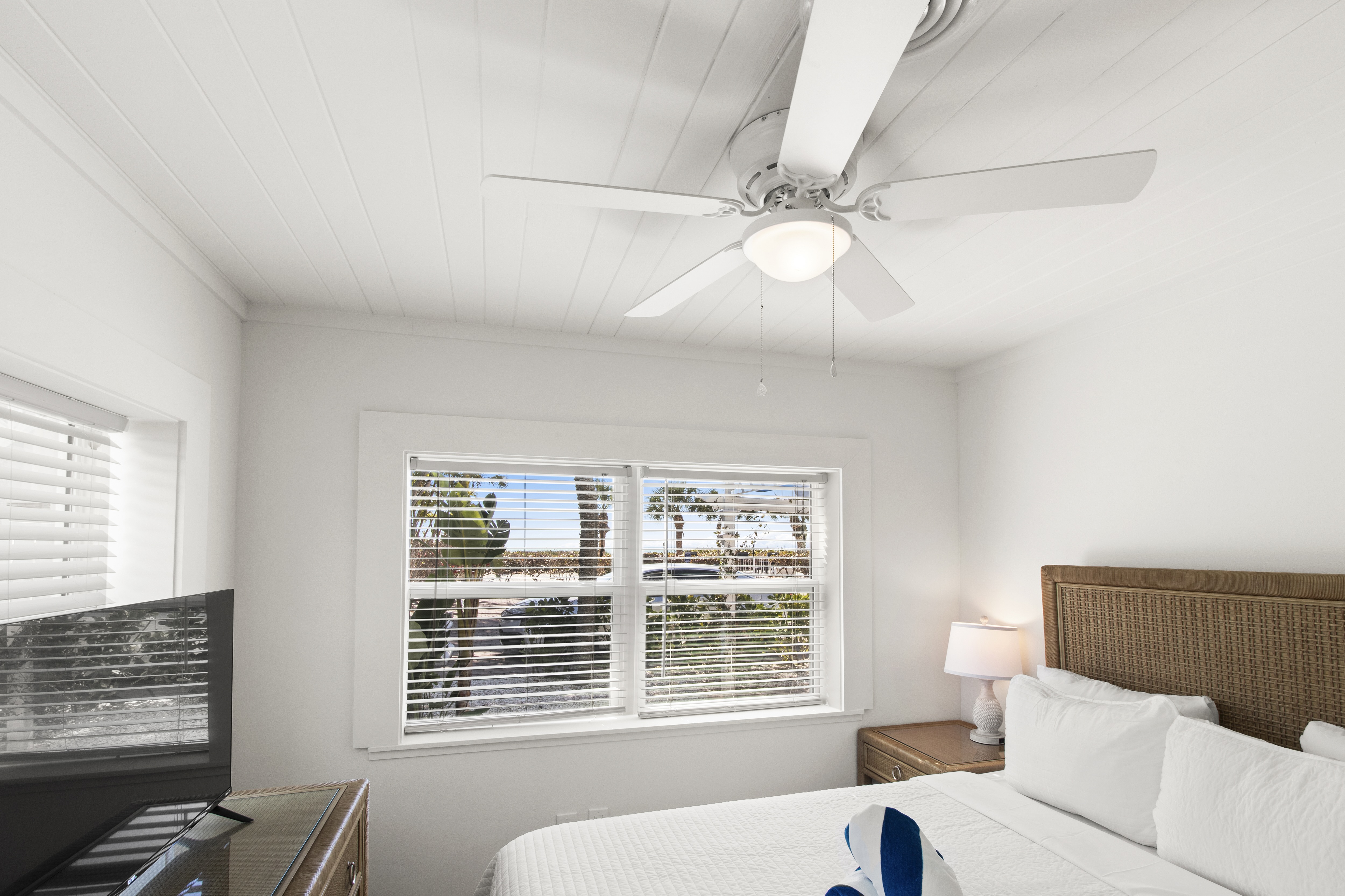Private porch and heated pool grounds at The Wicker Inn, Longboat Key