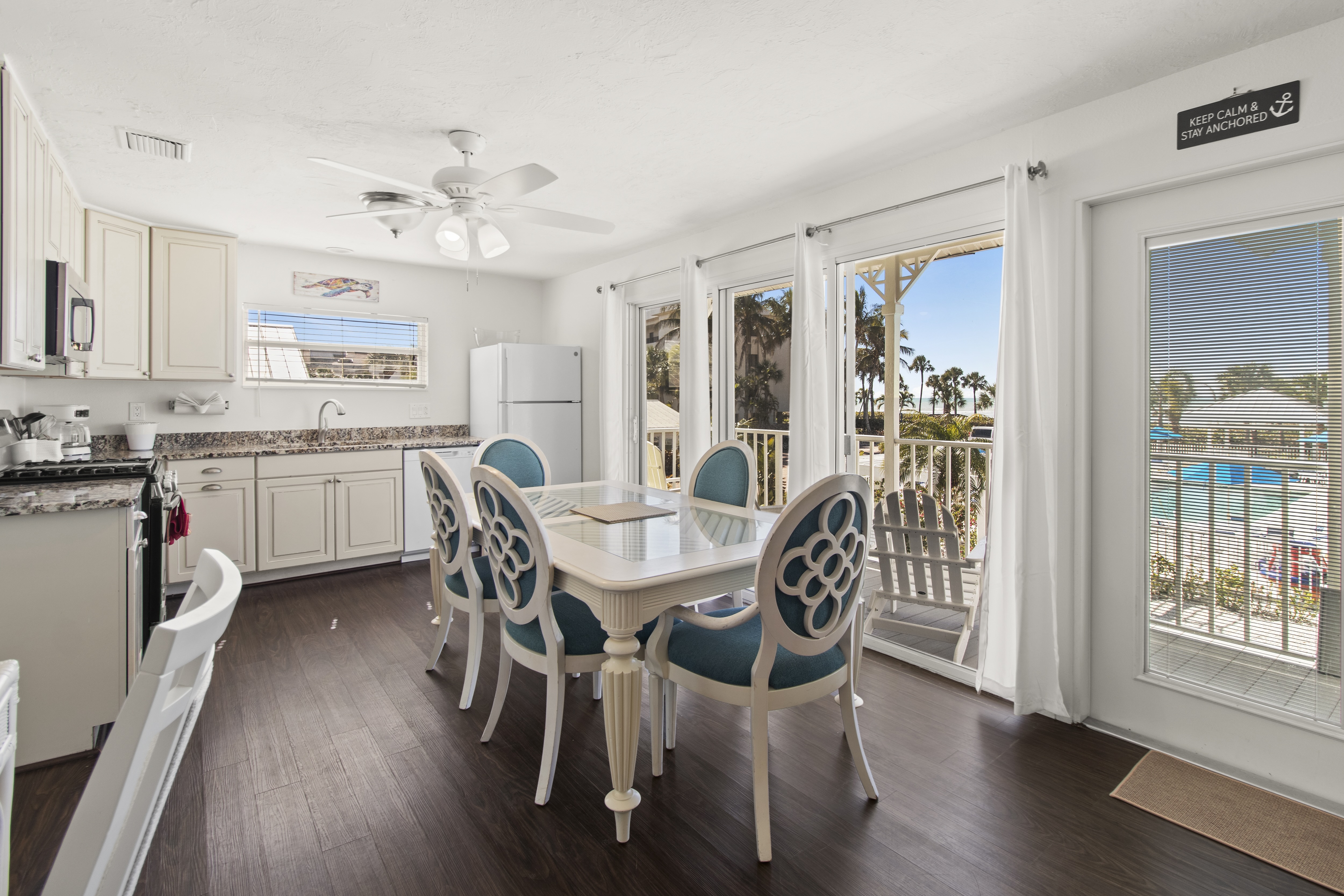 Suite living area with full kitchen at The Wicker Inn, Longboat Key