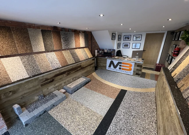 MB Resin Bound showroom display with various samples and logo at mbresinbound.