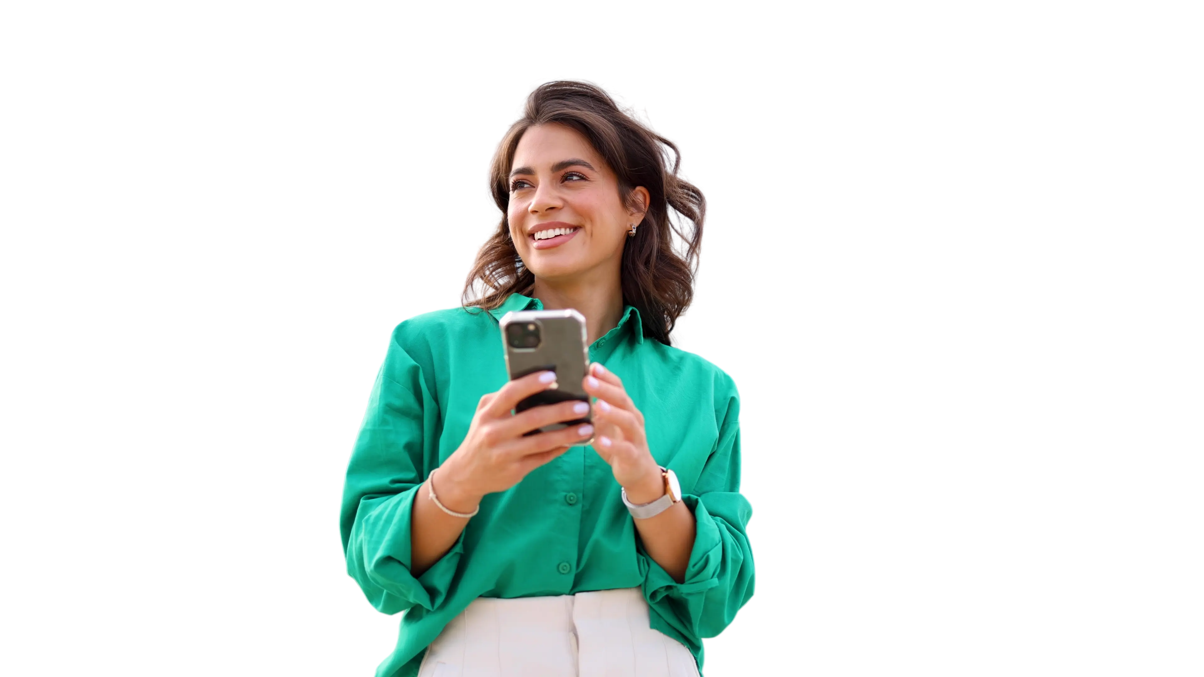 woman in green shirt holding phone looking up smiling