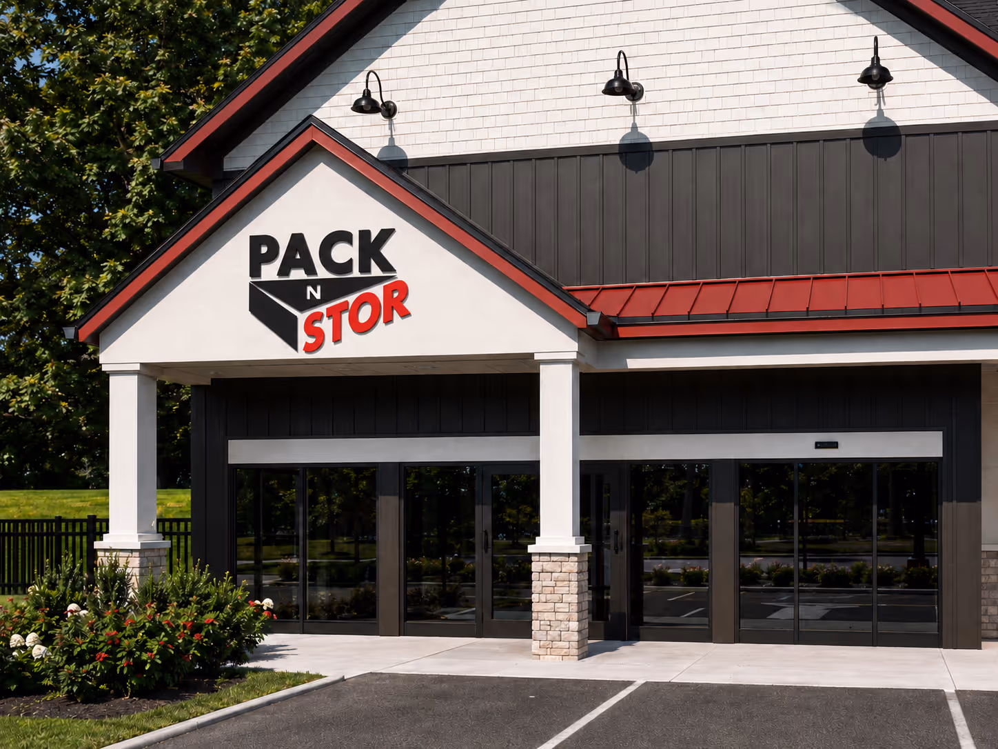 Front view of Pack N Stor East Fishkill NY self-storage facility with glass doors and landscaping.