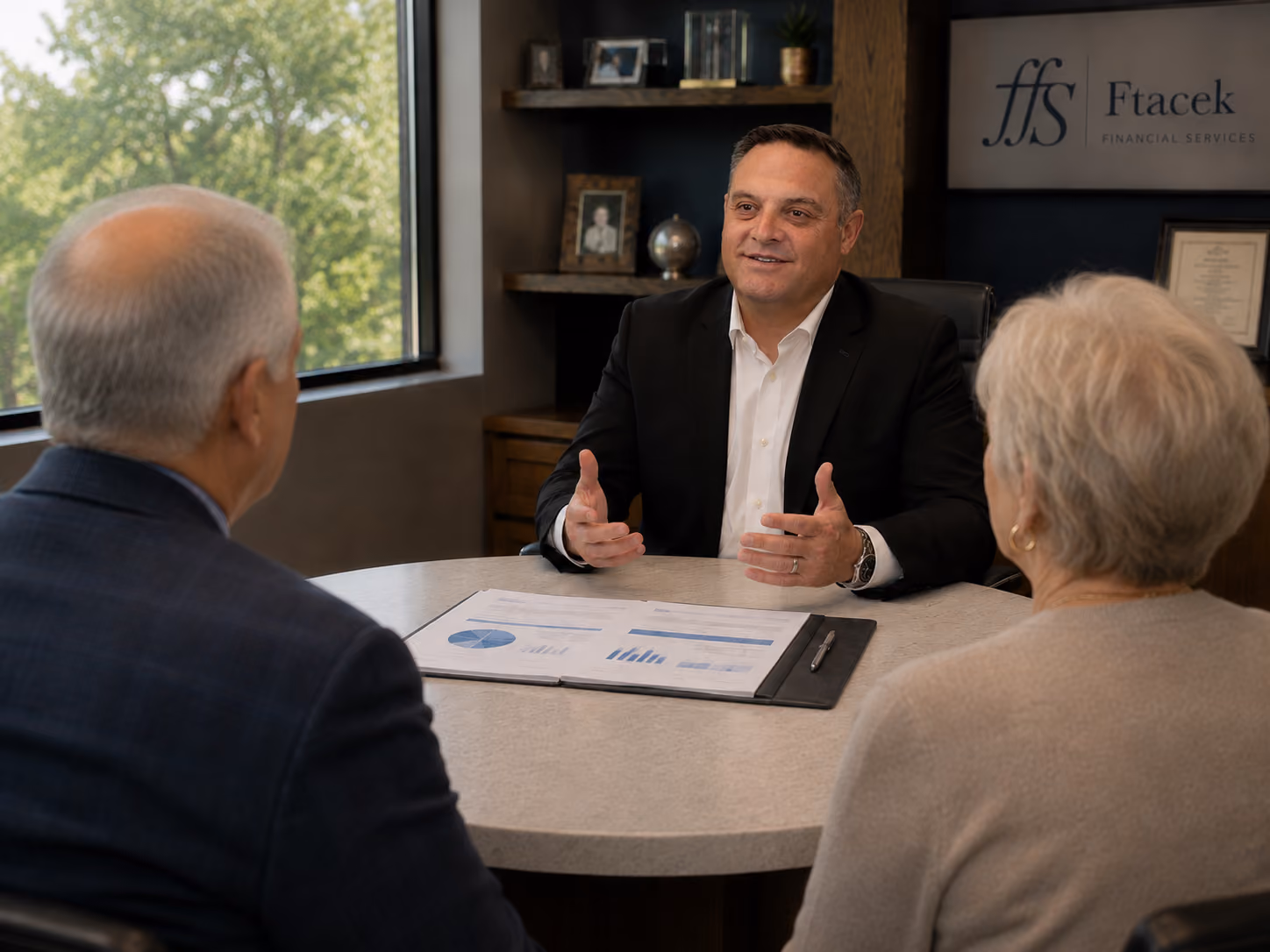 Jeremy Ftacek meeting with a client