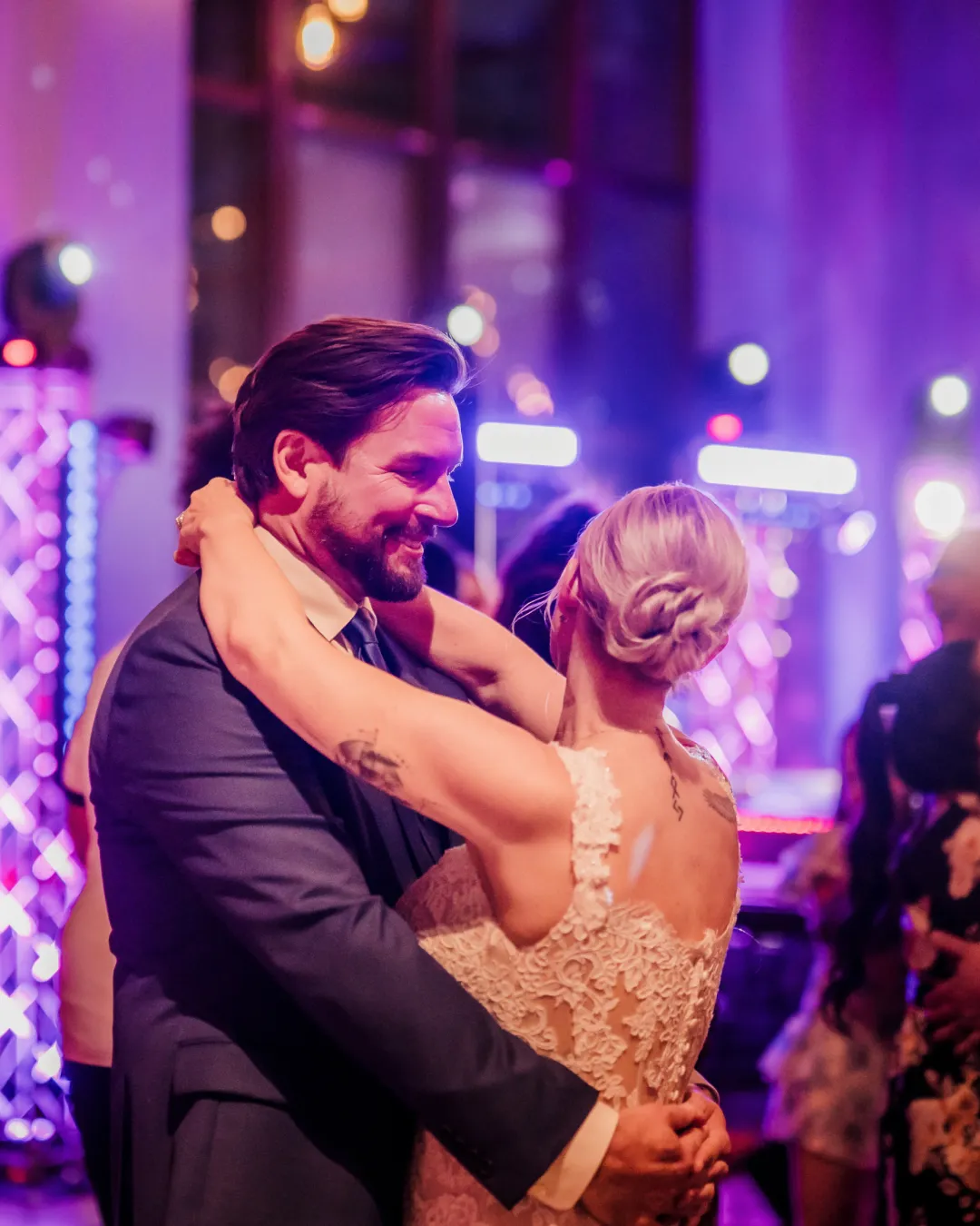 Newlyweds dancing during a Piano Fondue wedding performance