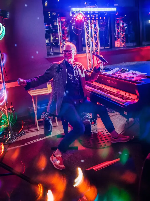 Josh Dupont performing with Piano Fondue at a live event