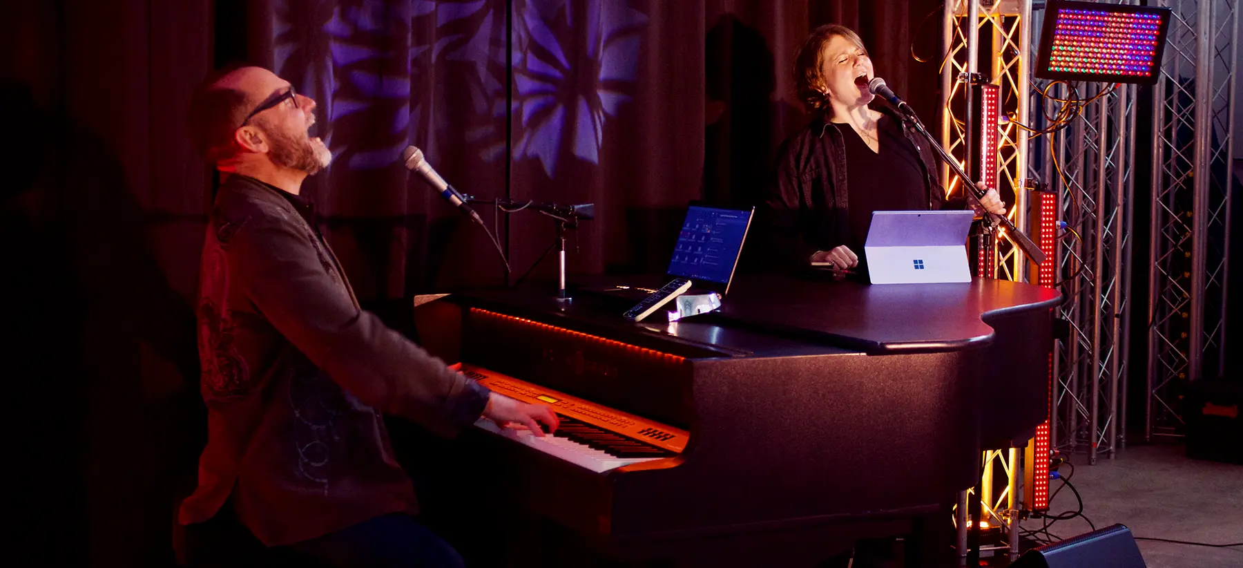 Piano Fondue team performing a live dueling pianos show
