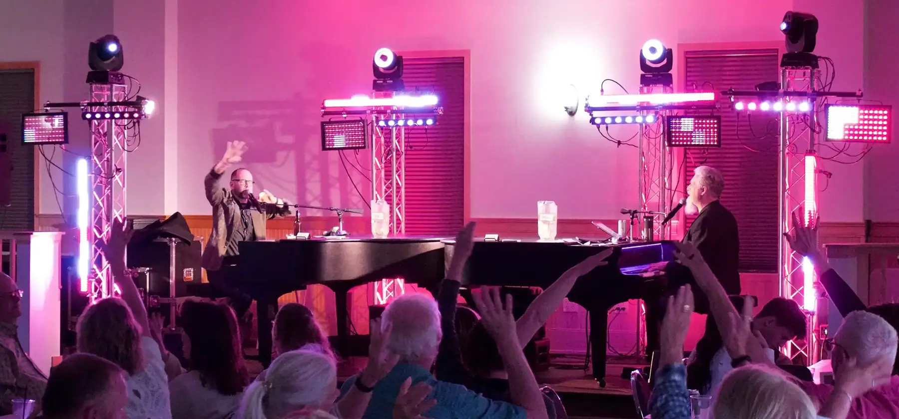 Piano Fondue performers during a live dueling pianos show