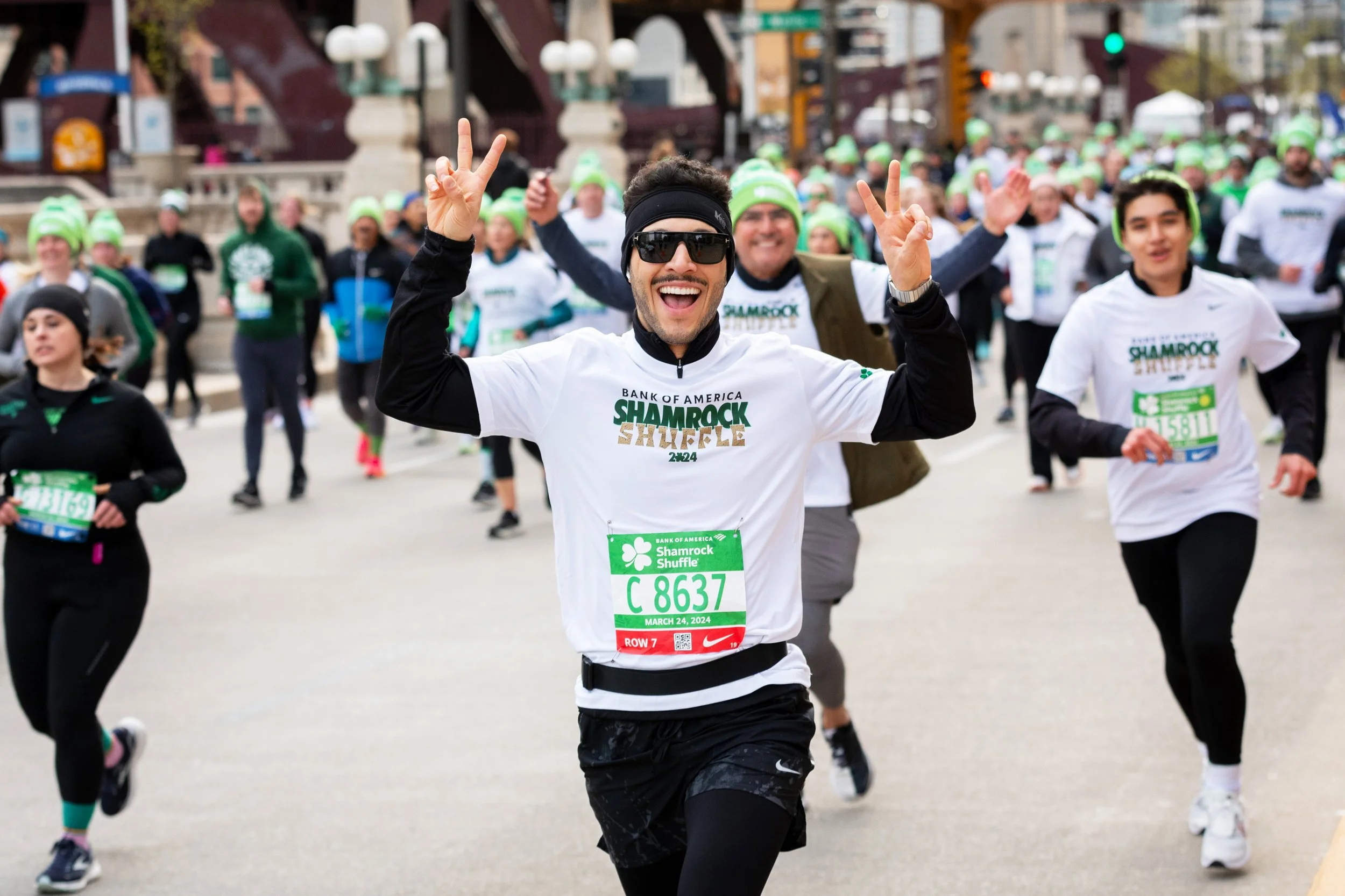 Happy runners enjoying The Bank of America Shamrock Shuffle