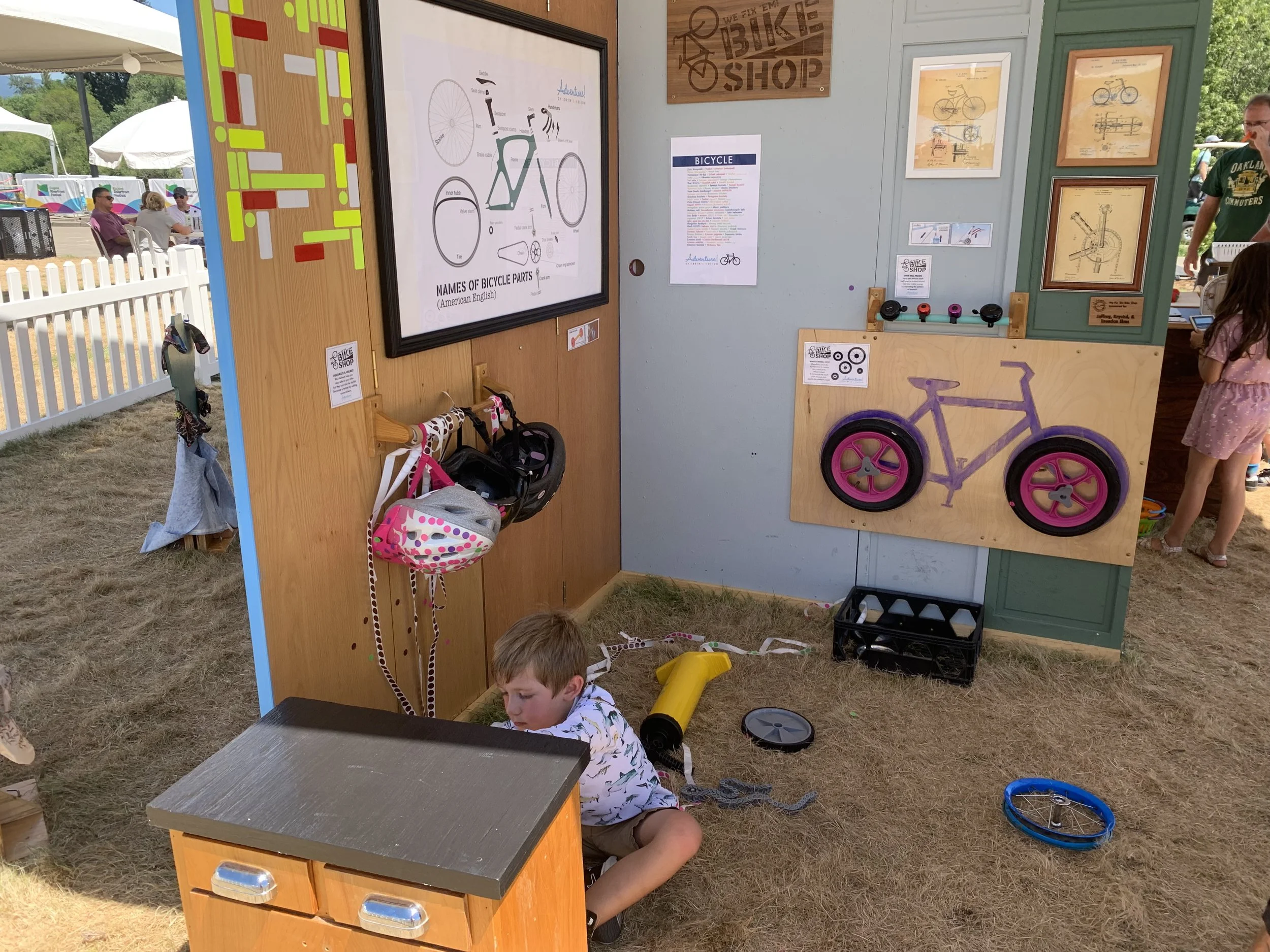 A kids bike shop station at The Eugene RiverFront Festival