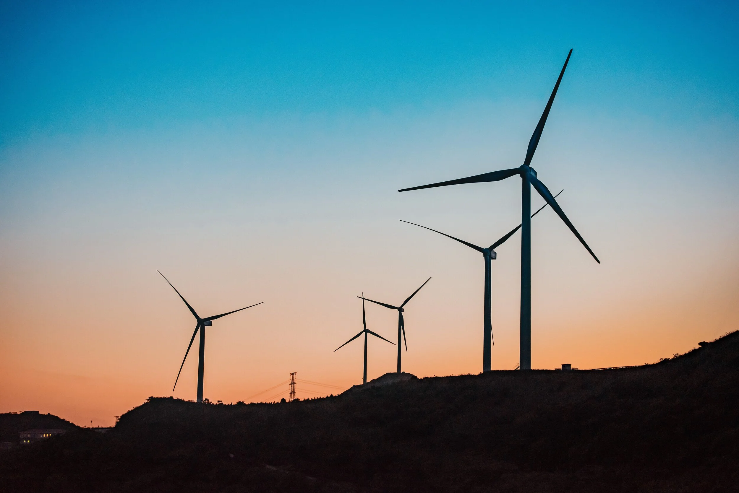 A wind farm during sunset