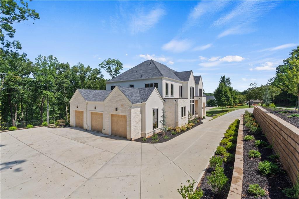 Three-car garage and front elevation of custom estate home
