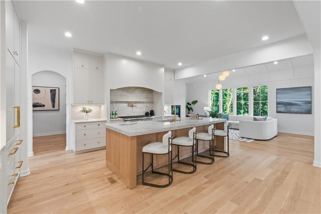 Custom kitchen island with quartz countertops and premium finishes