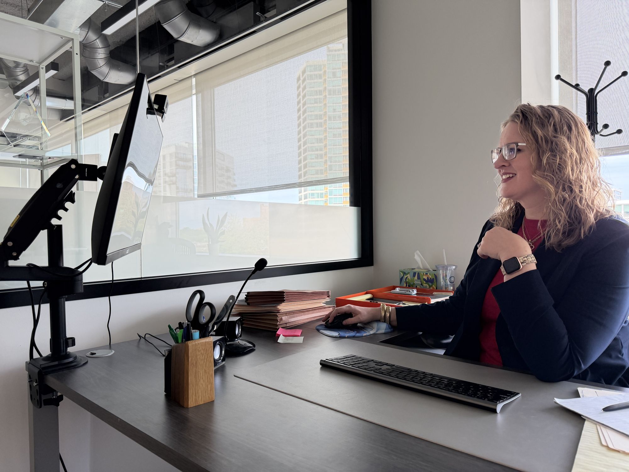Attorney Olivia Long at her desk in the Evanston office